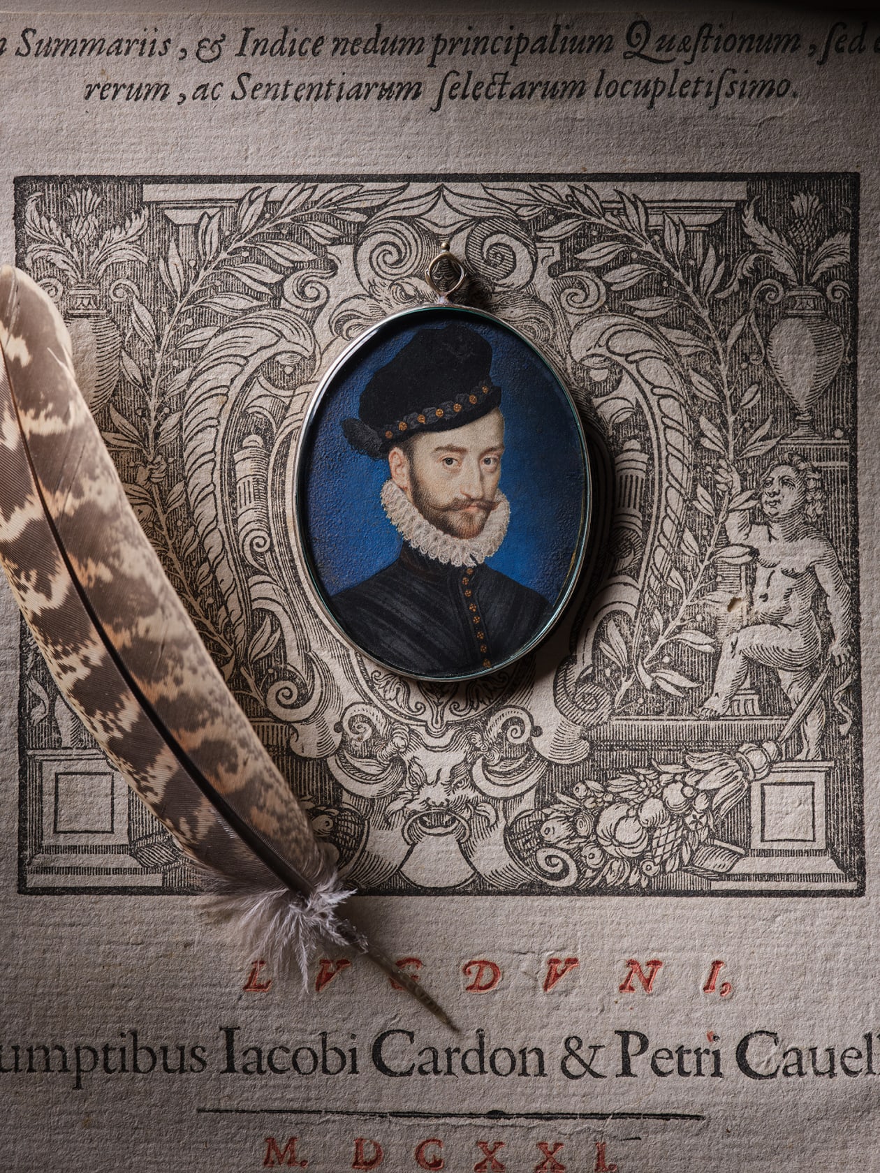 Watercolour on vellum, remains of gold border, laid down on card in later gilded silver locket frame Oval, 2 in (55 mm) high
