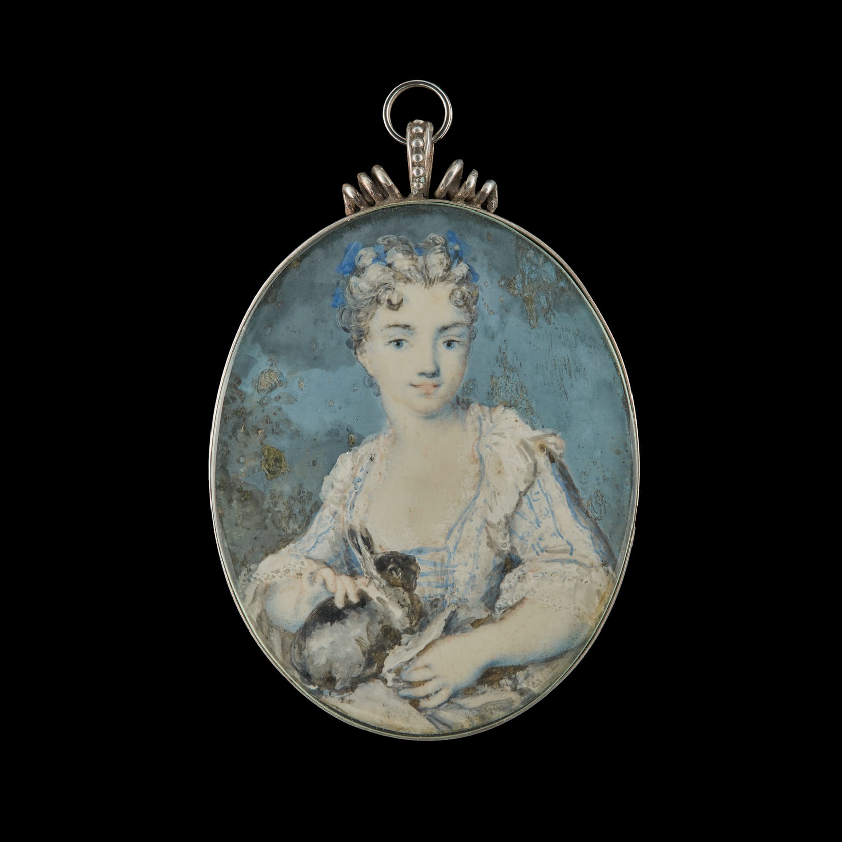 Rosalba Carriera, A young Girl, holding a rabbit, wearing blue figured dress with blue ribbons in her powdered hair, possibly in an allegory of &lsquo;Autumn&rsquo;, c. 1715. Previously with Philip Mould & Company.