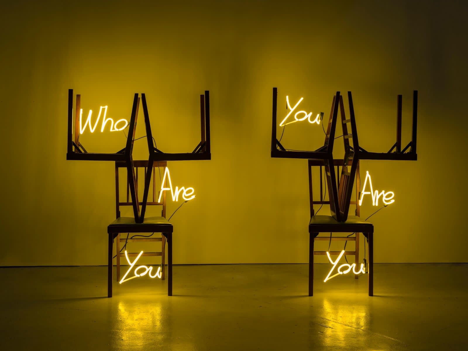 Carl Hopgood Be Yourself Wooden chairs and yellow neon