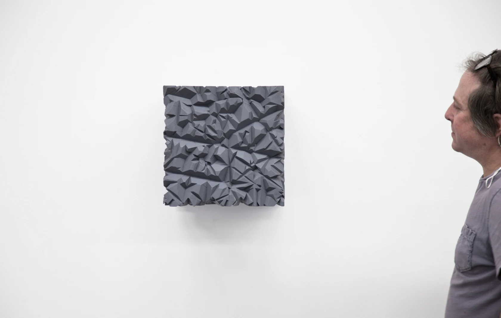 Tom Friedman, Untitled (Grey Cube on Wall), 2015