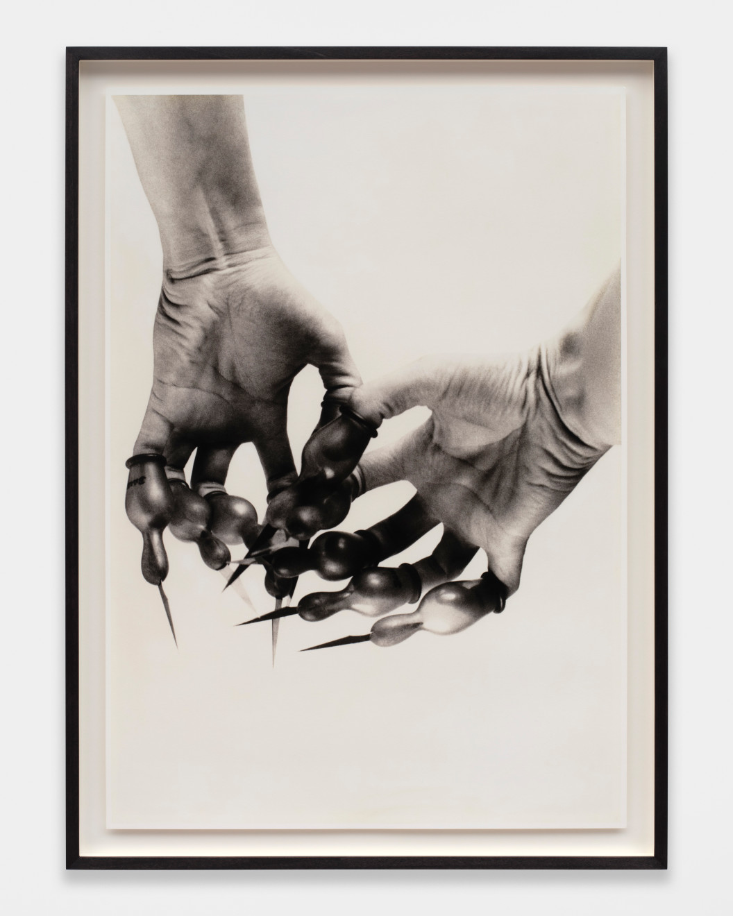 Renate Bertlmann, Messer-Schnuller-Hände (Knife-pacifier-hands), 1981