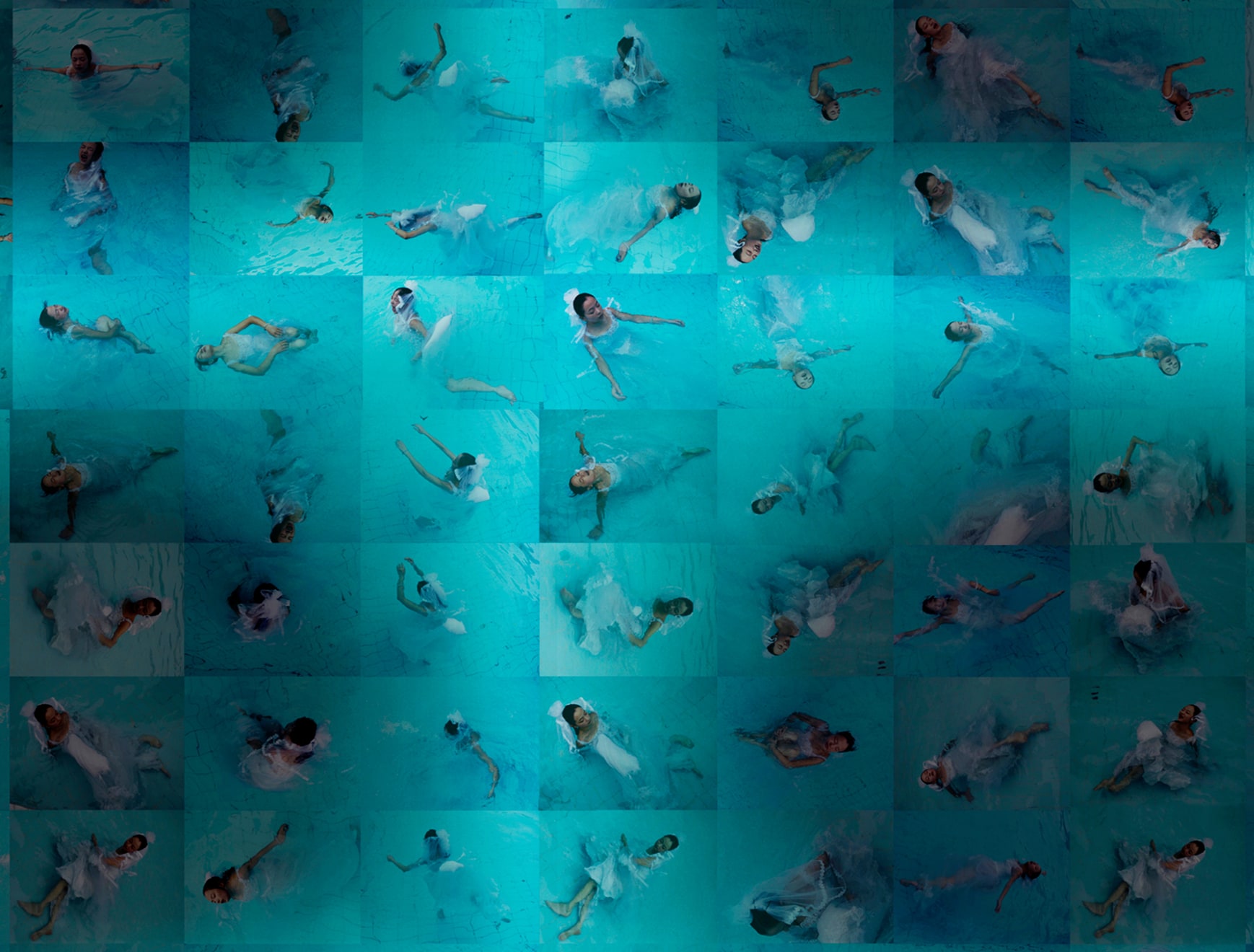 A collection of 49 shots taken from a high angle that show artist Chen Qiulin in white wedding dress in a swimming pool in 2005.