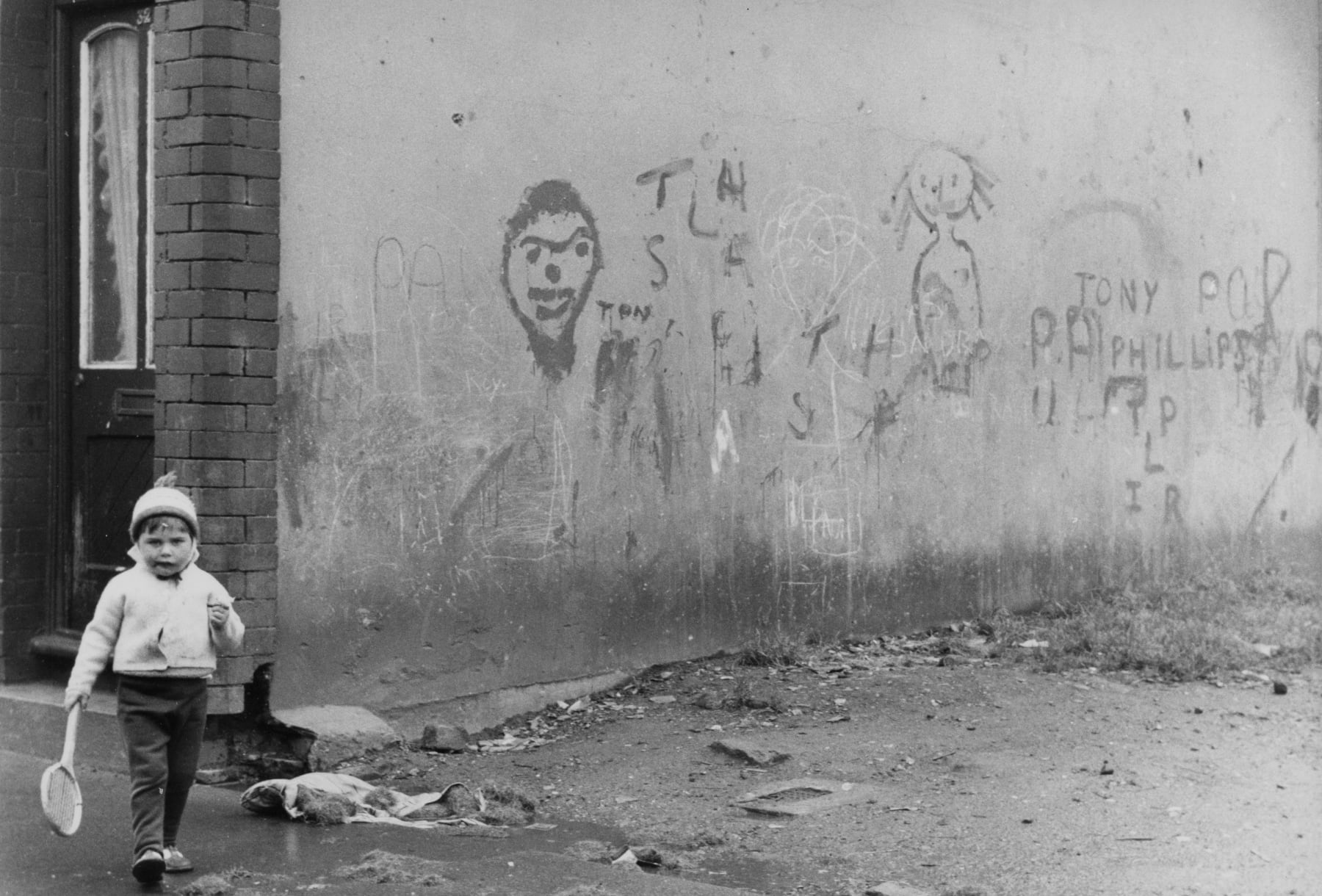 Shirley Baker, Untitled, (Child and graffiti wall), 1967