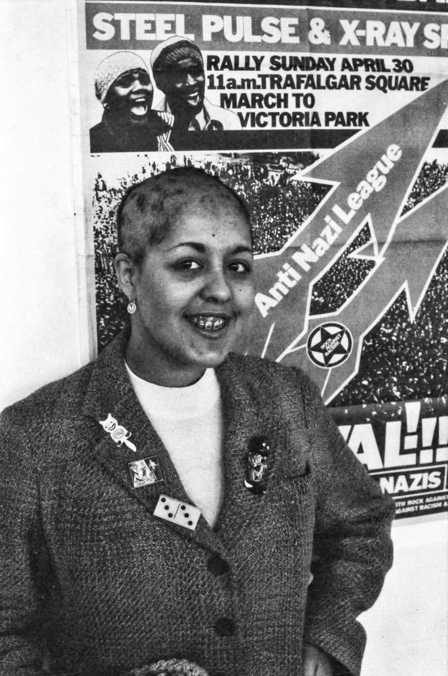 Caroline Coon, Poly Styrene lead singer of her band X-Ray Spex, turban off back stage after she had performed at the Rock Against Racism concert, Victoria Park, 1978