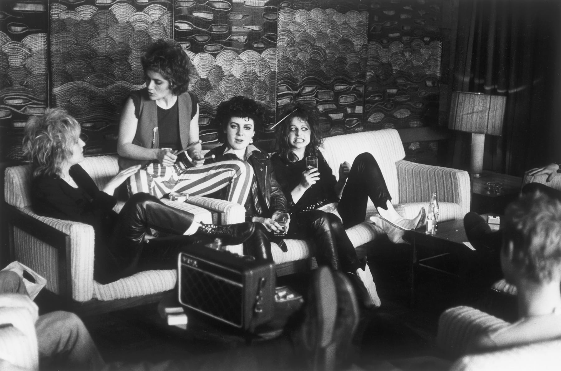Caroline Coon, The Slits. Viv Albertine (guitar), Palmolive (drummer), Tessa Pollitt (bass) and Ari-up (lead singer) in the Post House Lobby, Cardiff, before going to the Top Rank gig on The Clash ‘White Riot’ tour., 1977