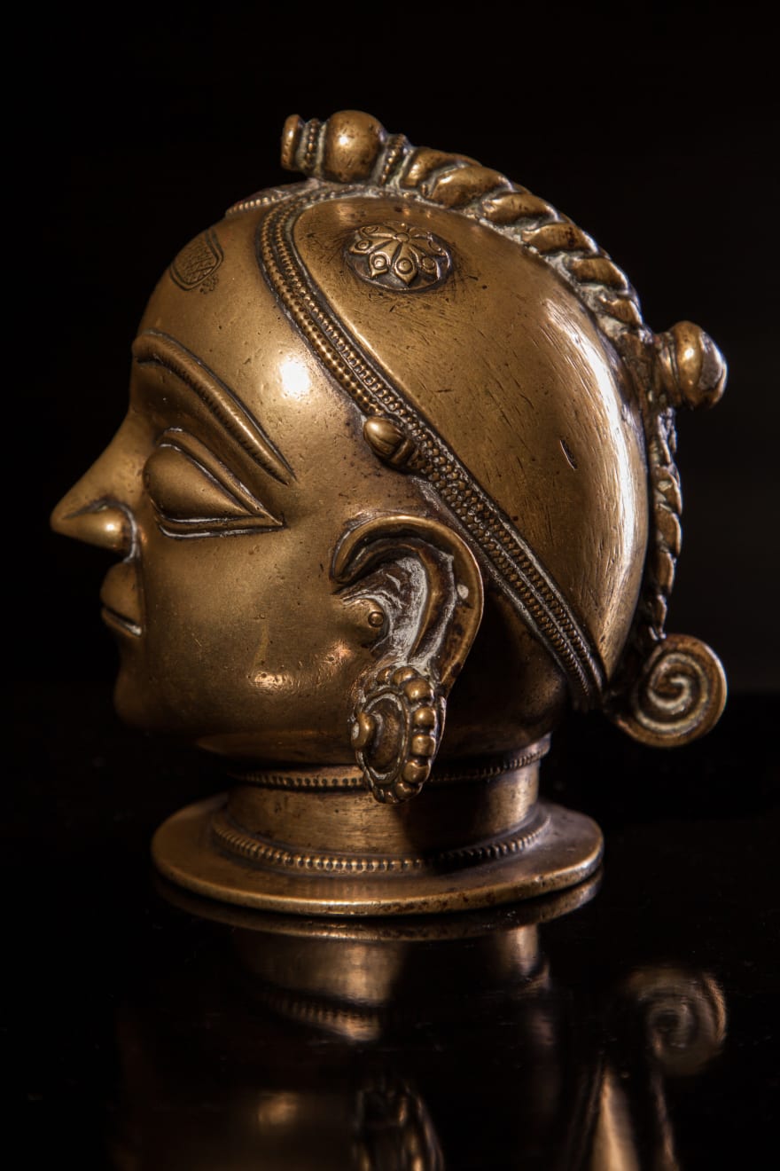 Jameson J Wood, A Brass Head with Plaited Topknot, 1770
