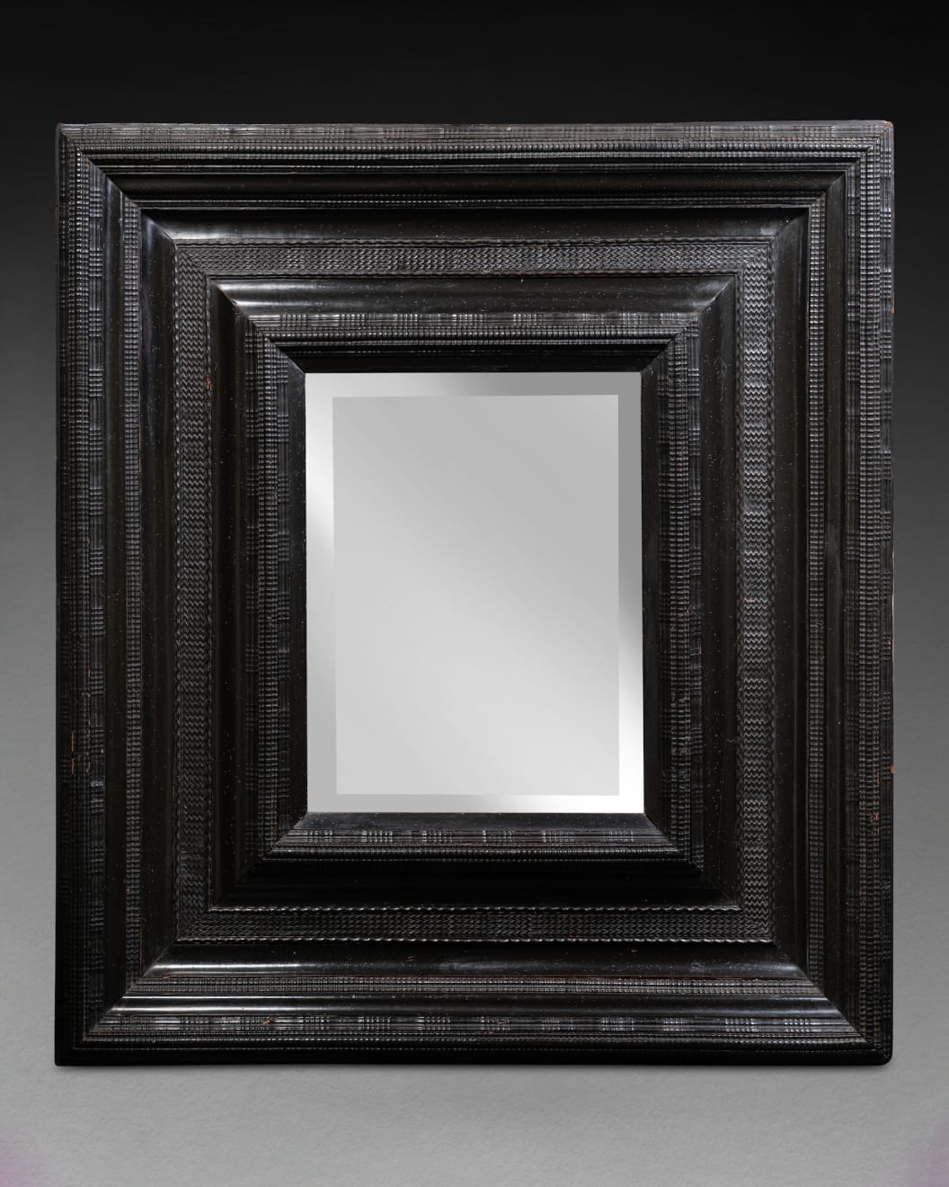 Italy, Monumental ebonised mirror, Mid 17th Century