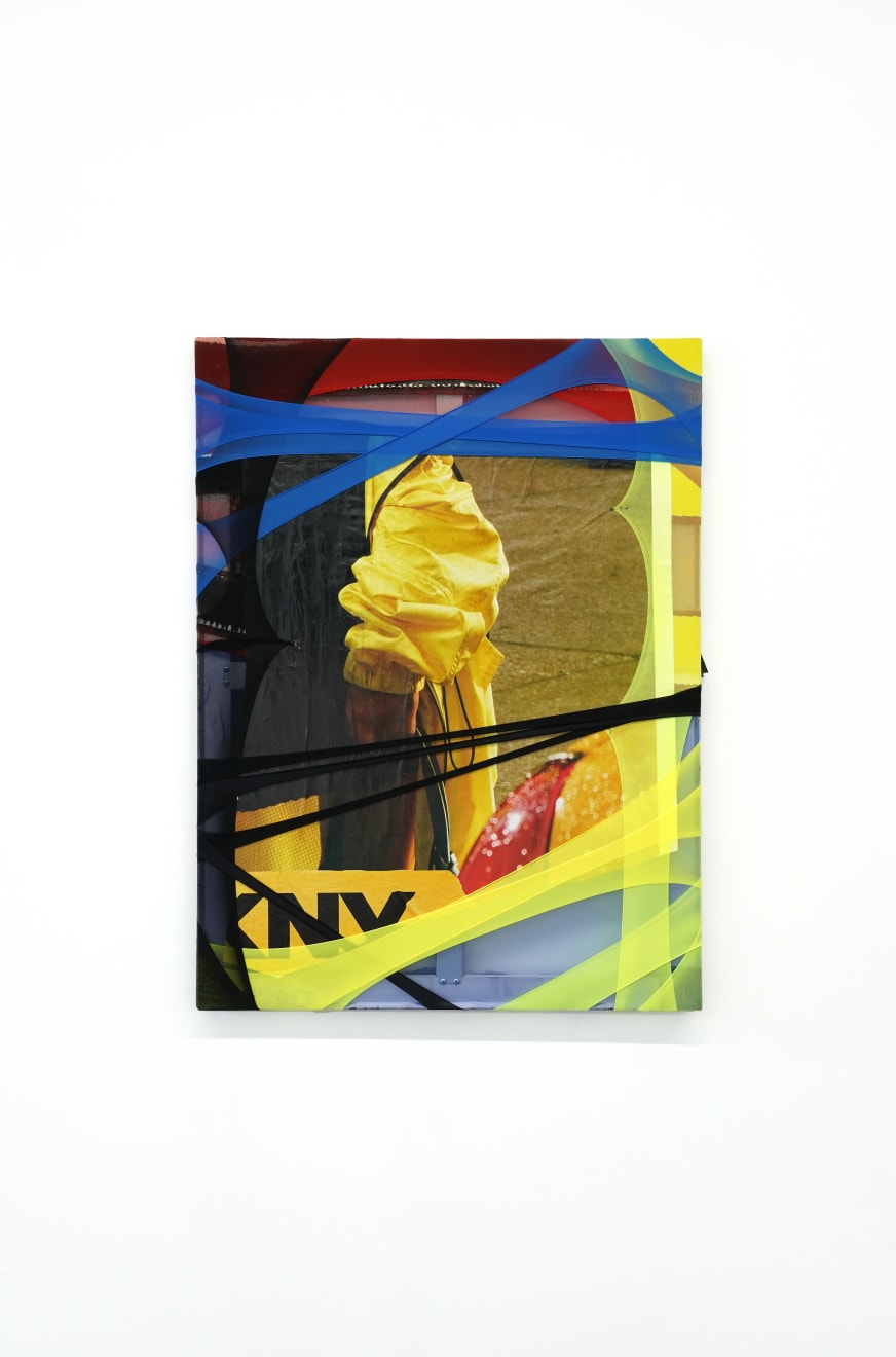 abstract fabric collage with a snippet of a photo of a person wearing a rain jacket