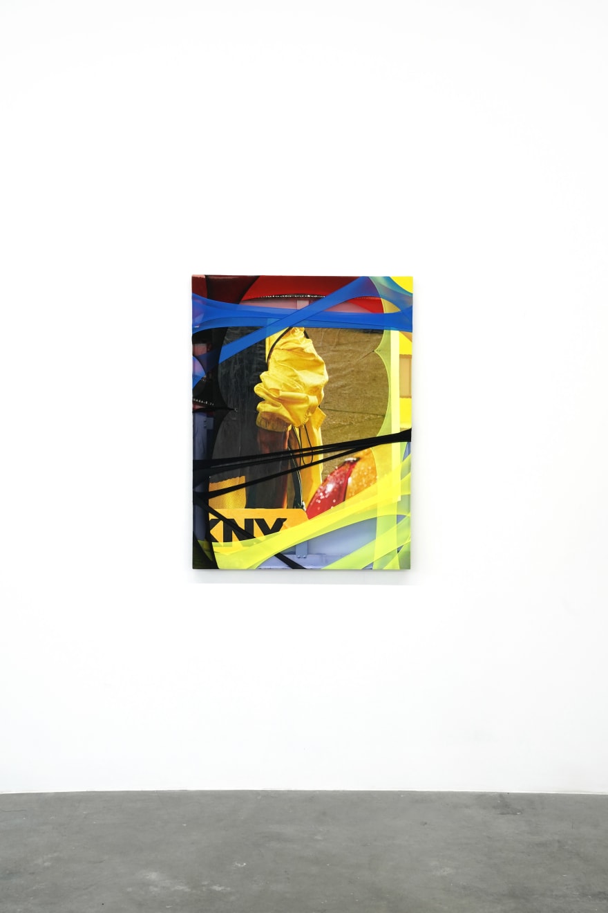 abstract fabric collage with a snippet of a photo of a person wearing a rain jacket