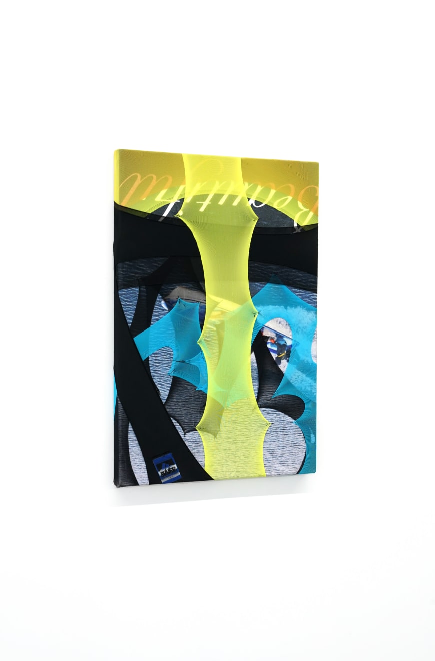 abstract fabric artwork including a text that says 