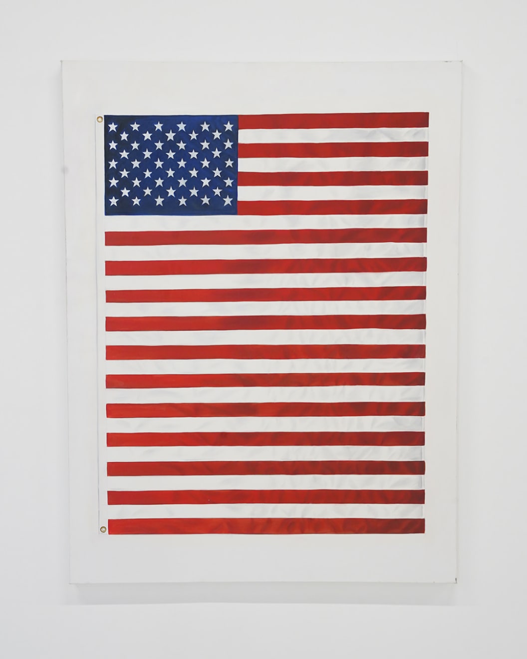painting of an American Flag with extra red stripes making it longer