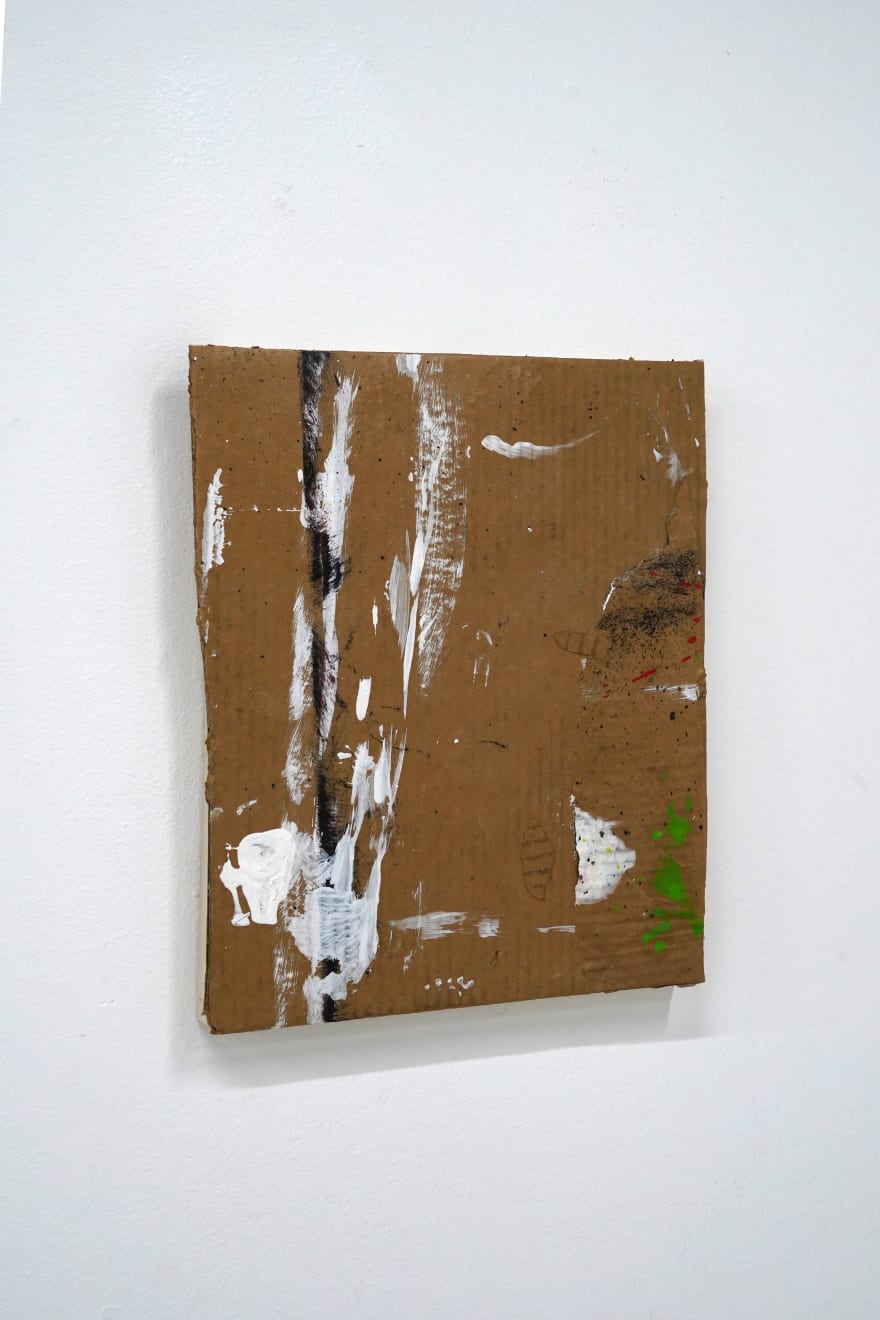 piece of cardboard with paint on it