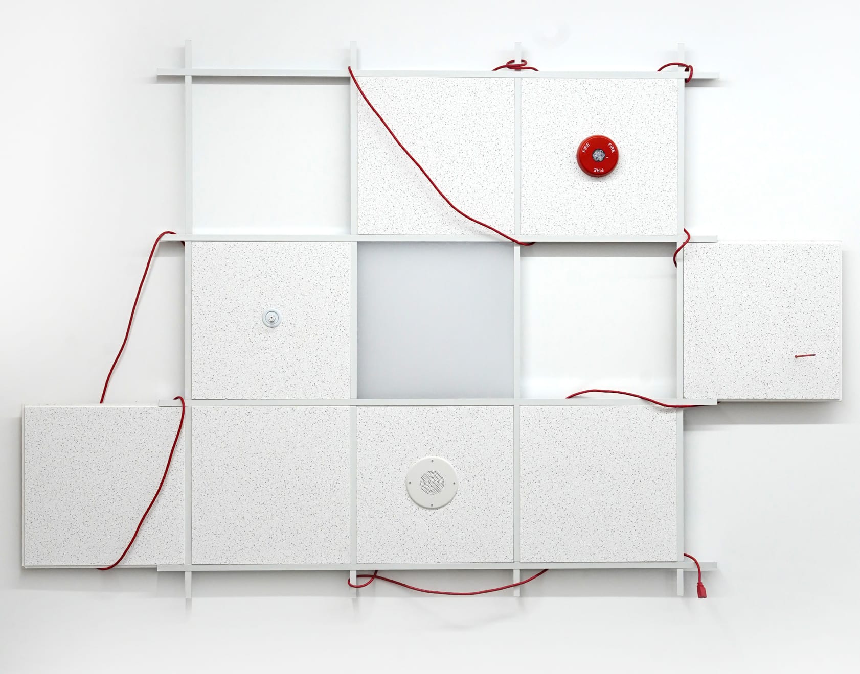 office ceiling with red chord mounted on the wall