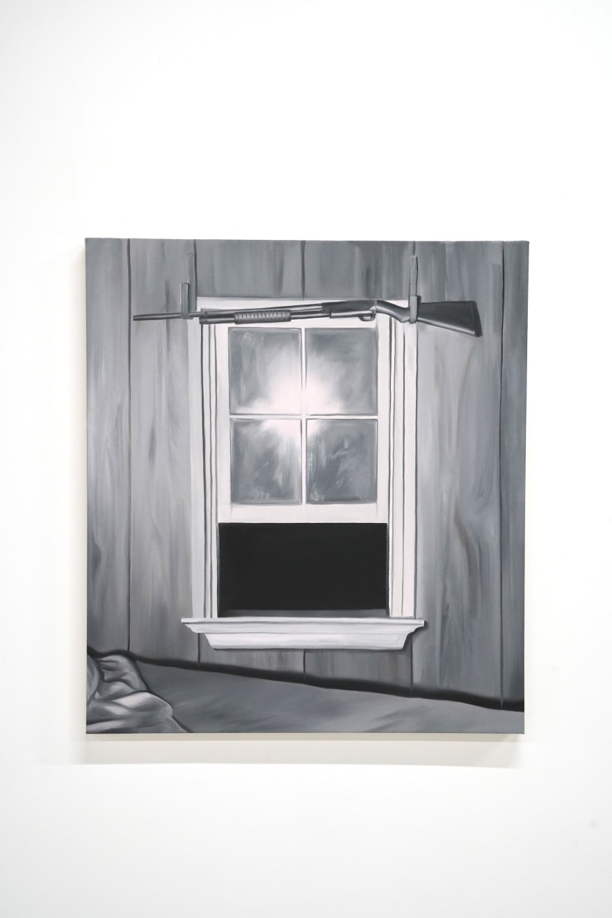 black and white painting of a gun hung above a window