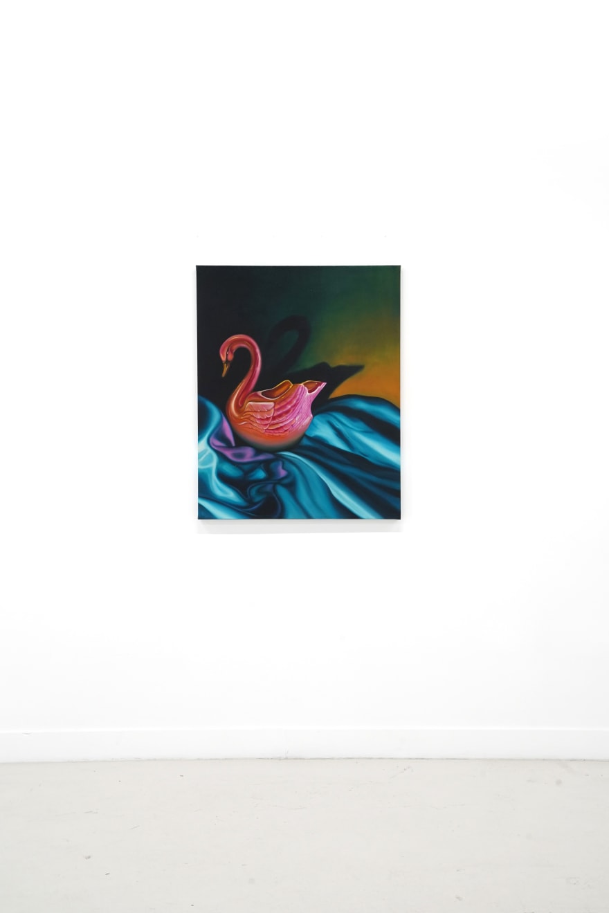 painting of a pink swan on blue fabric