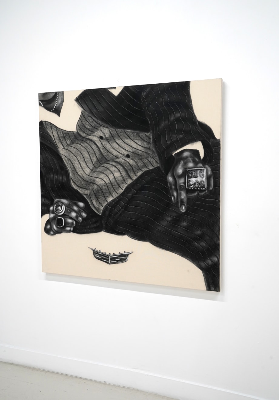 black and white charcoal drawing of a man lounging with a cadillac symbol below him