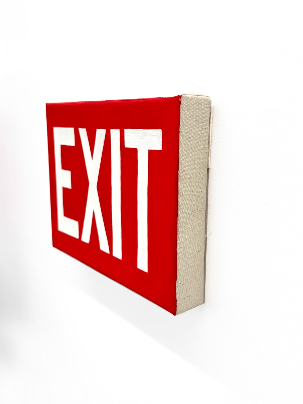 water cooler with an exit sign