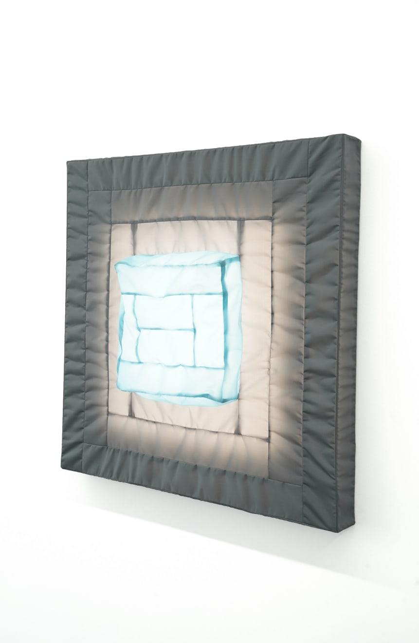 gray/blue fabric light hung on wall