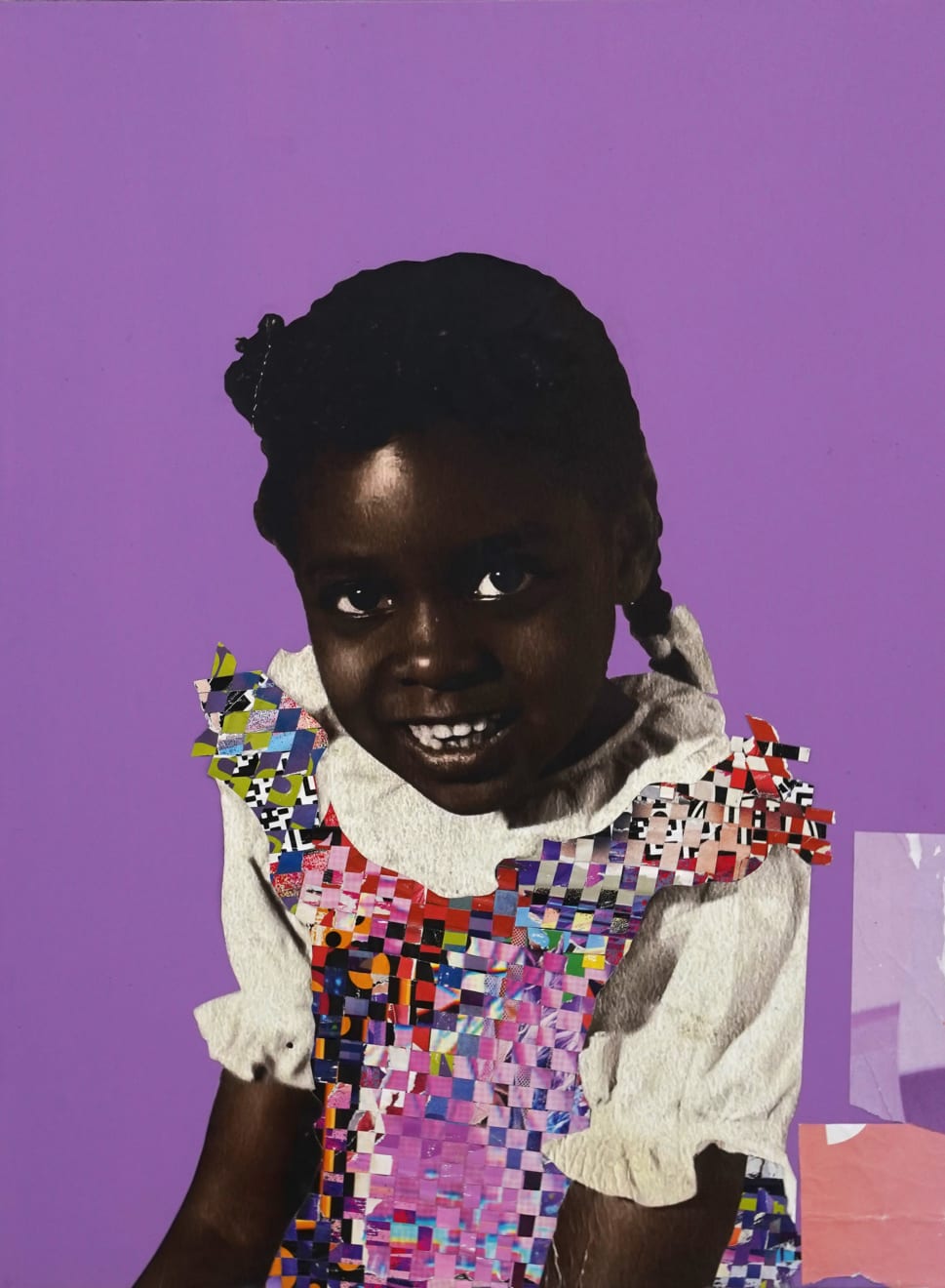 paper collage of a young child on a purple background