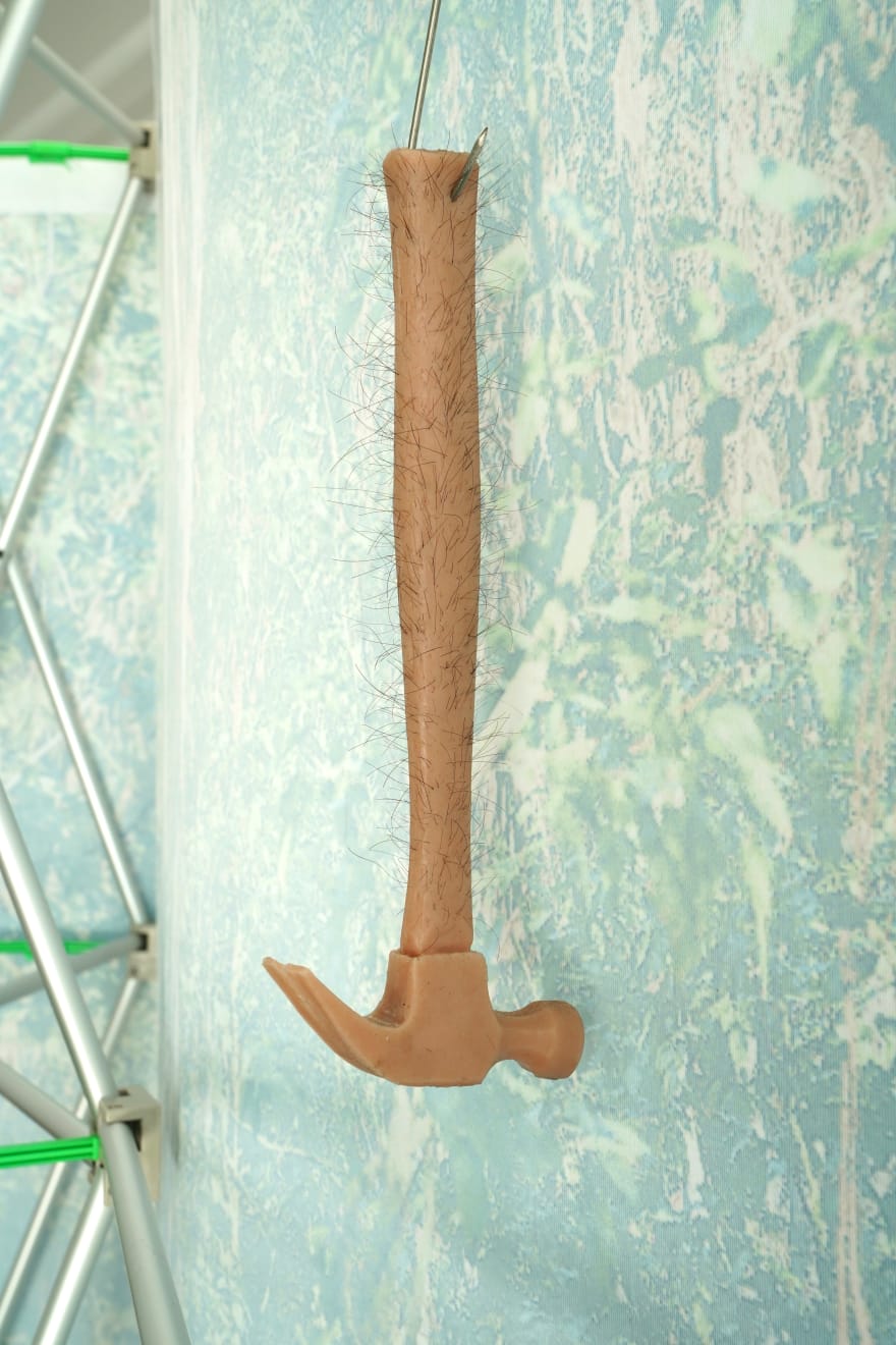 hammer resembling human skin with hair
