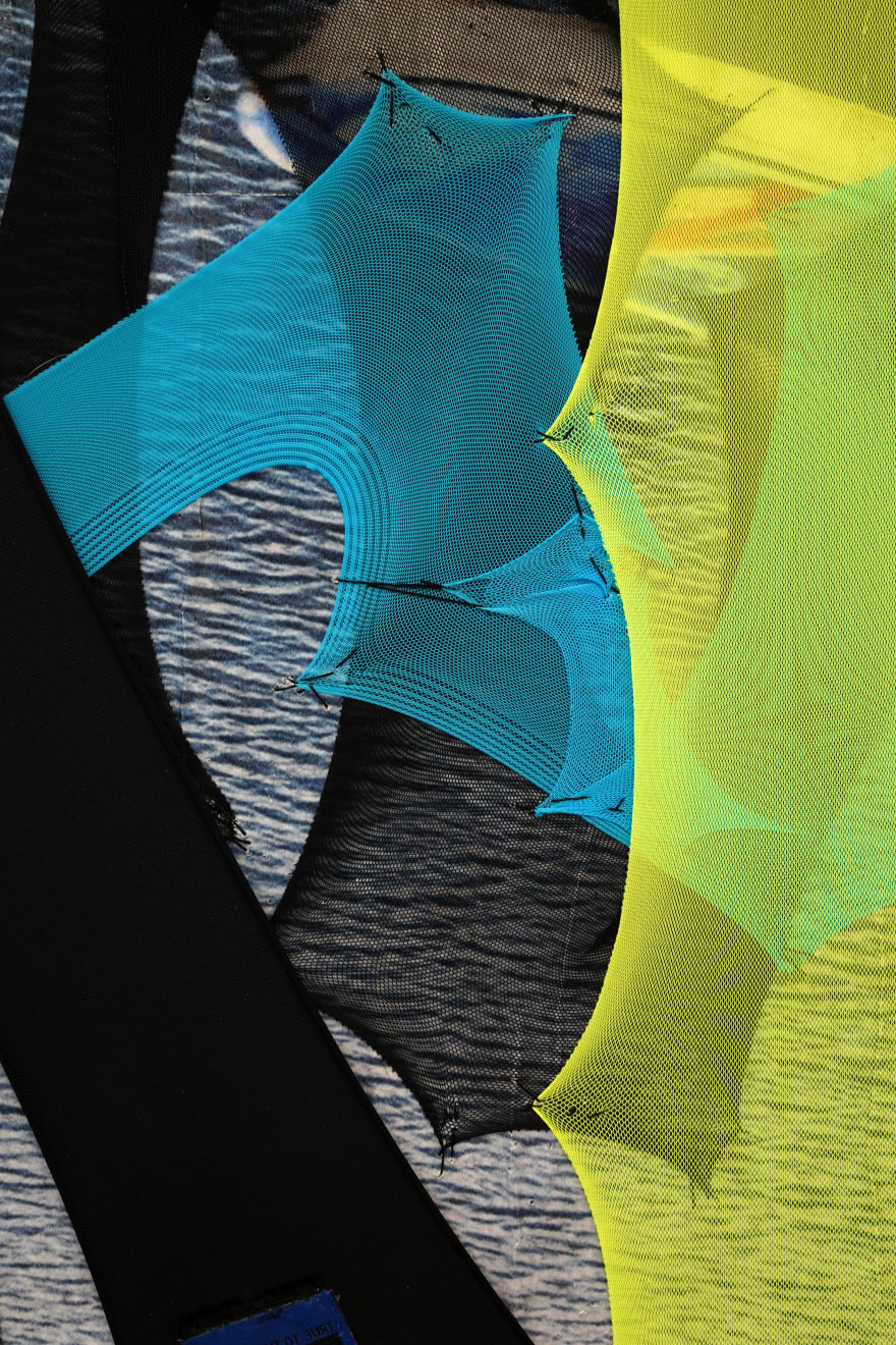 abstract fabric artwork including a text that says 