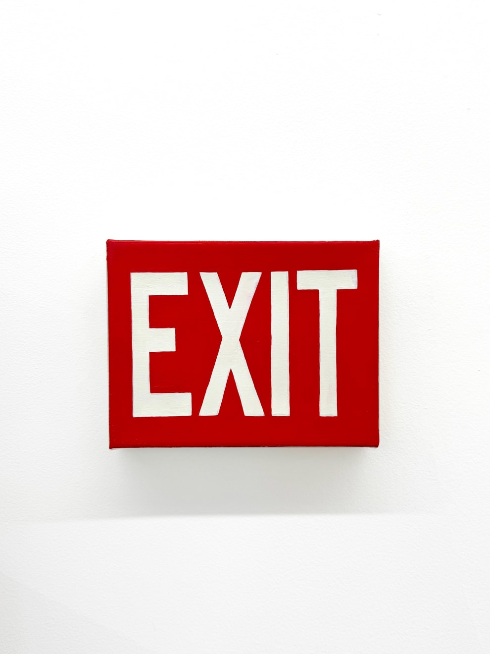 water cooler with an exit sign