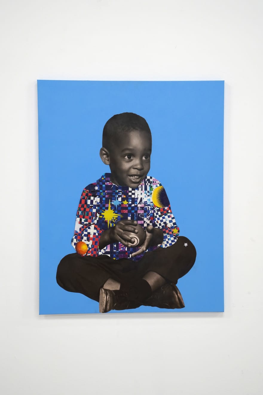 paper collage of a young child on a blue background