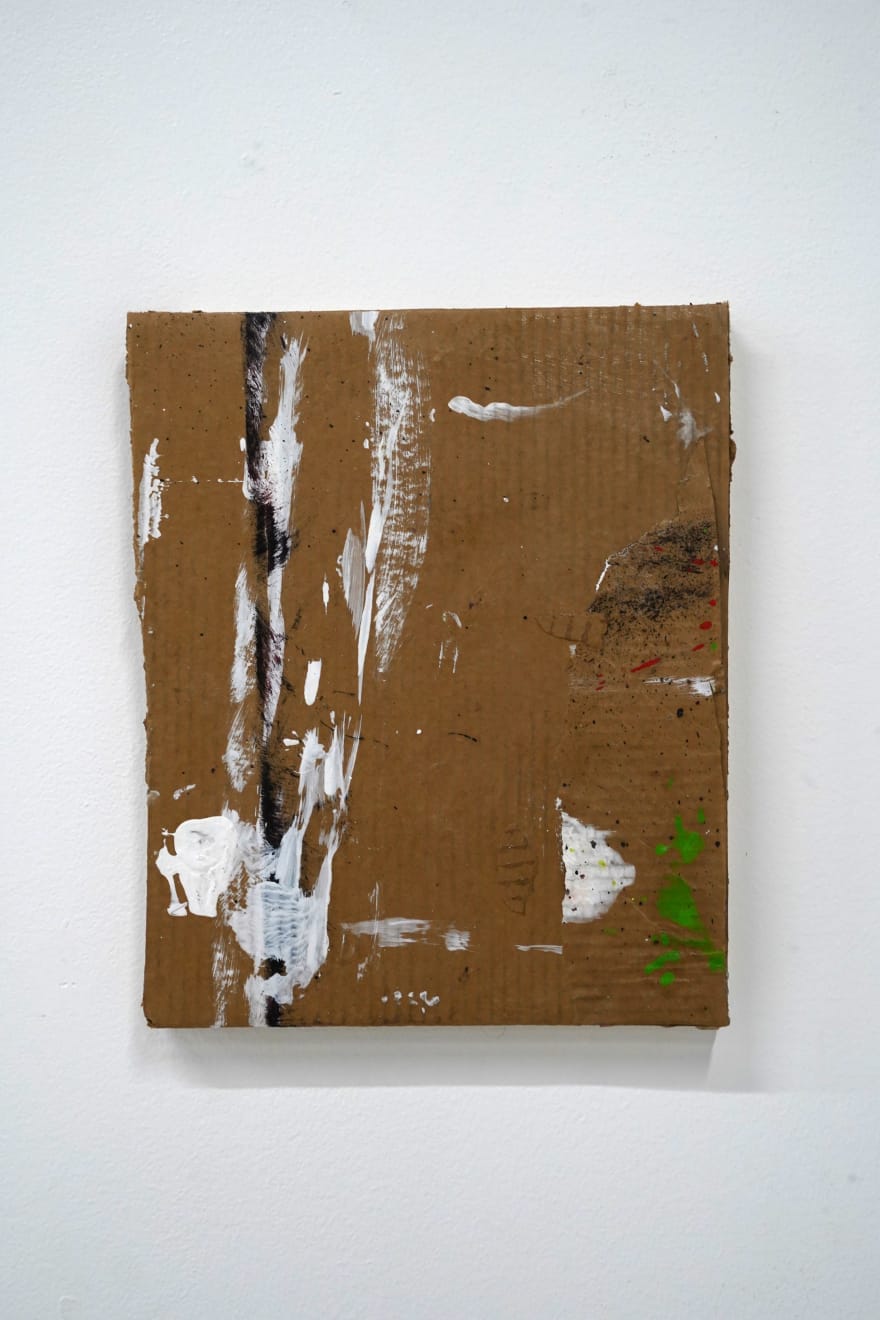 piece of cardboard with paint on it