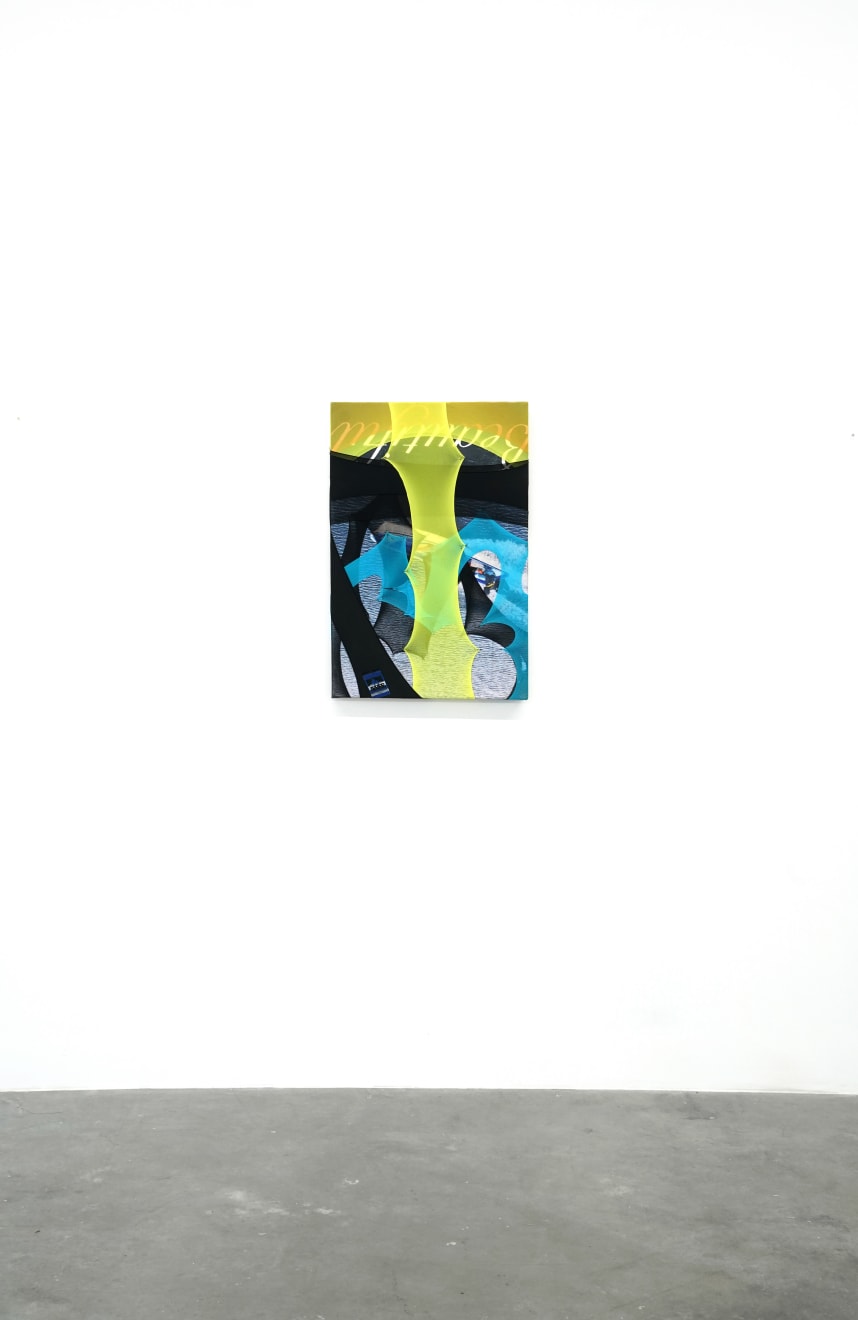 abstract fabric artwork including a text that says 