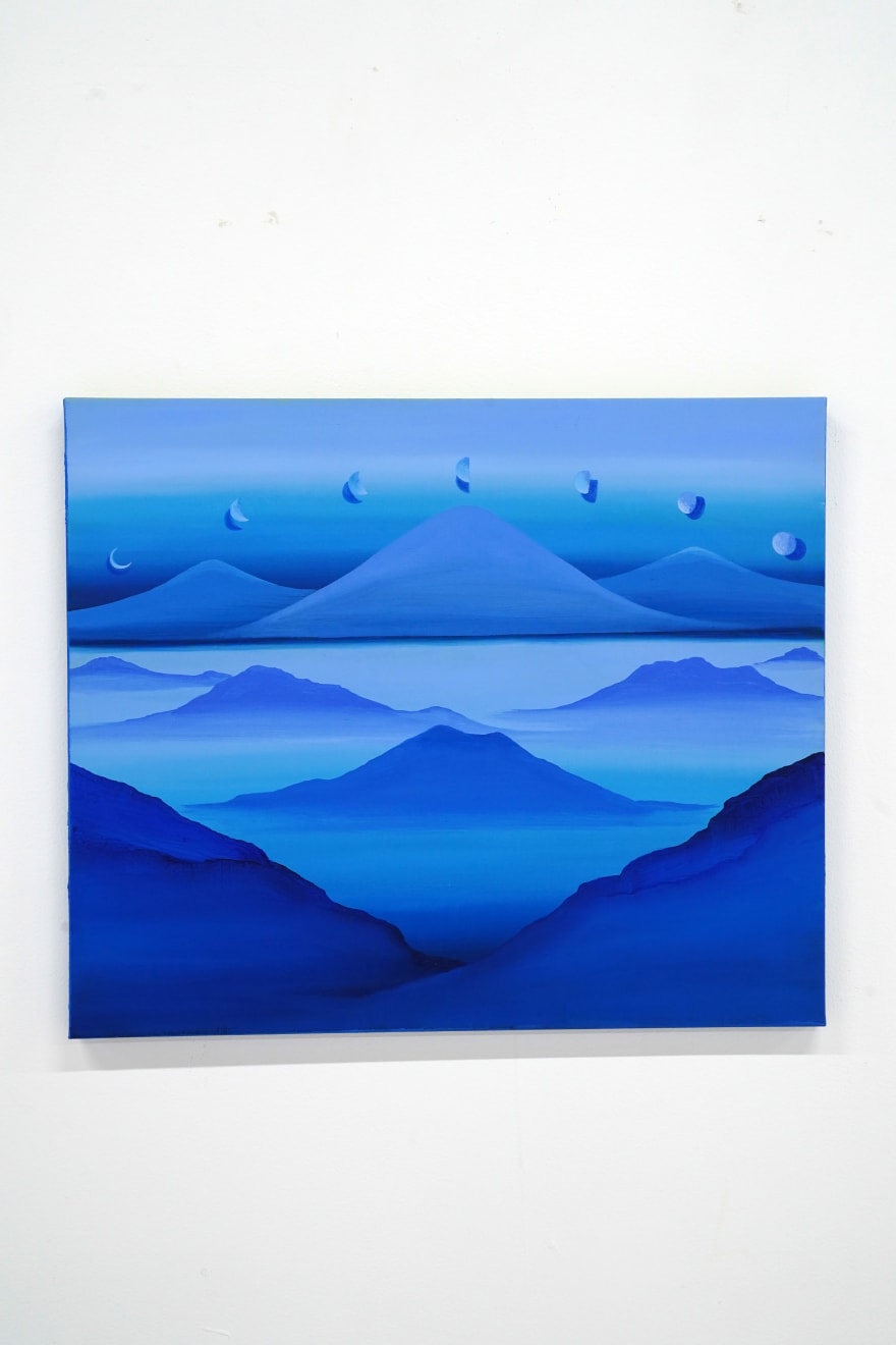 blue paintings on mountain landcape with moons above it