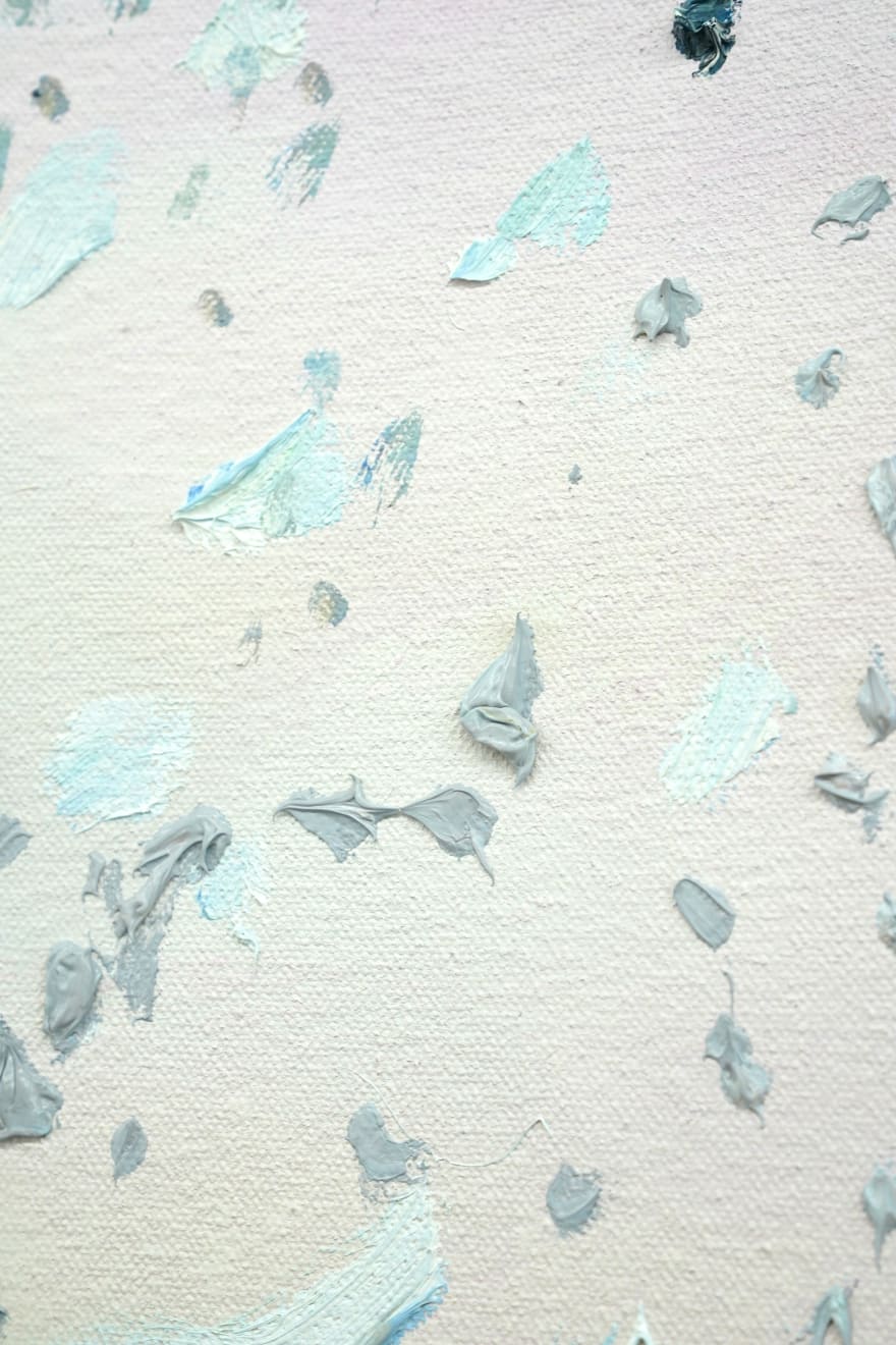 painting of two riders on white horses