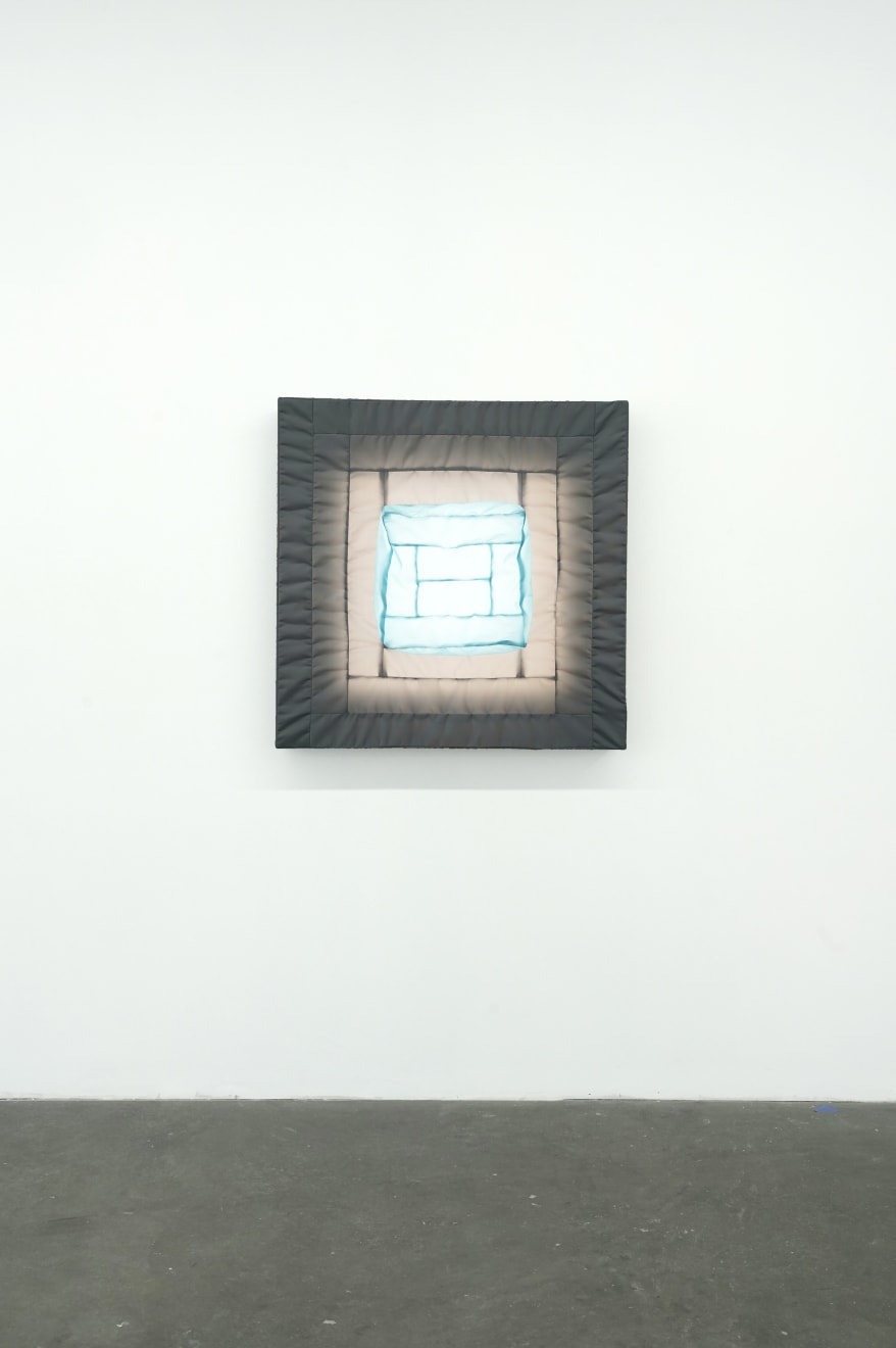 gray/blue fabric light hung on wall