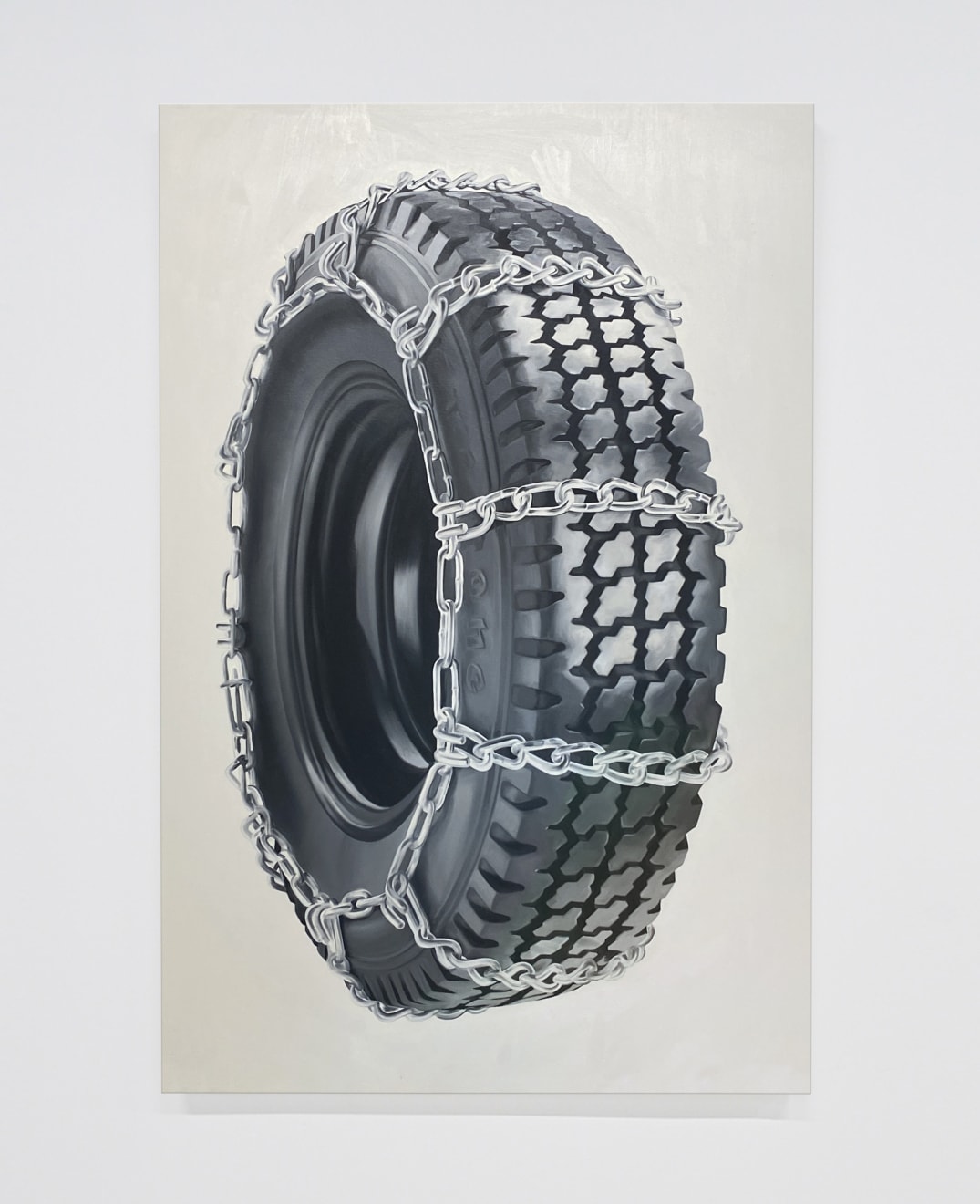 black and white painting of a tire with chains on it