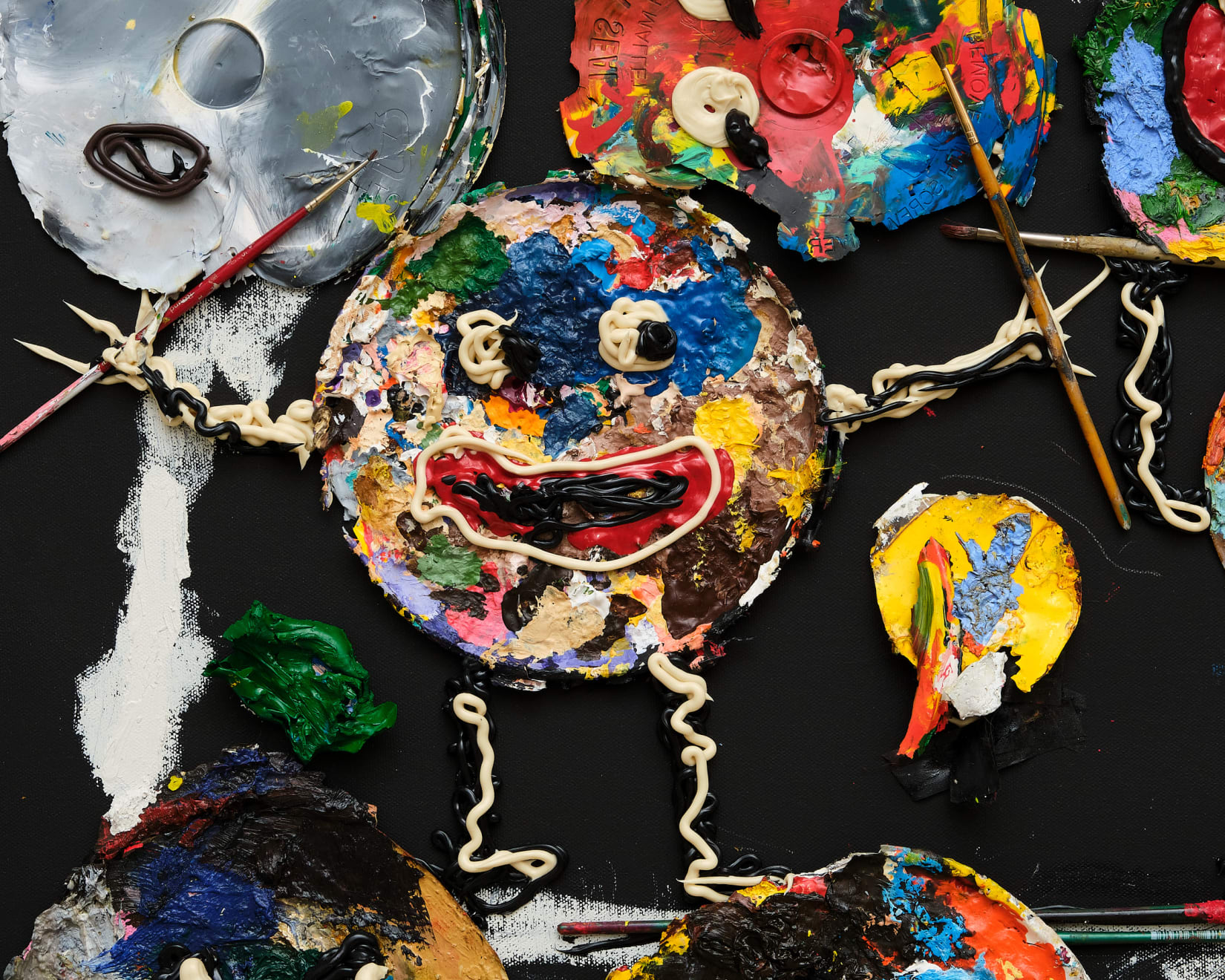 abstract painting of smiley faces