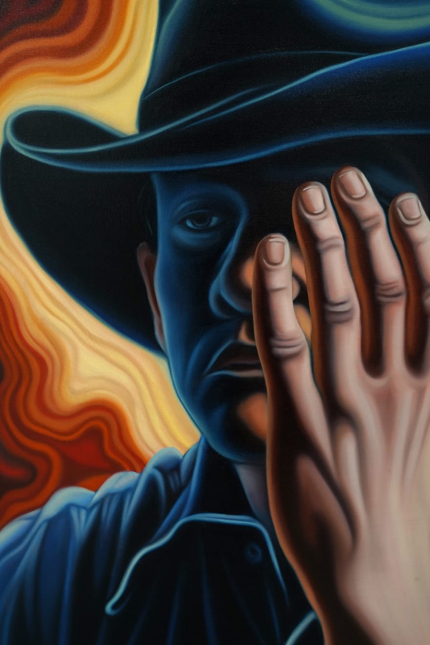 painting of a cowboy covering his face with his hand