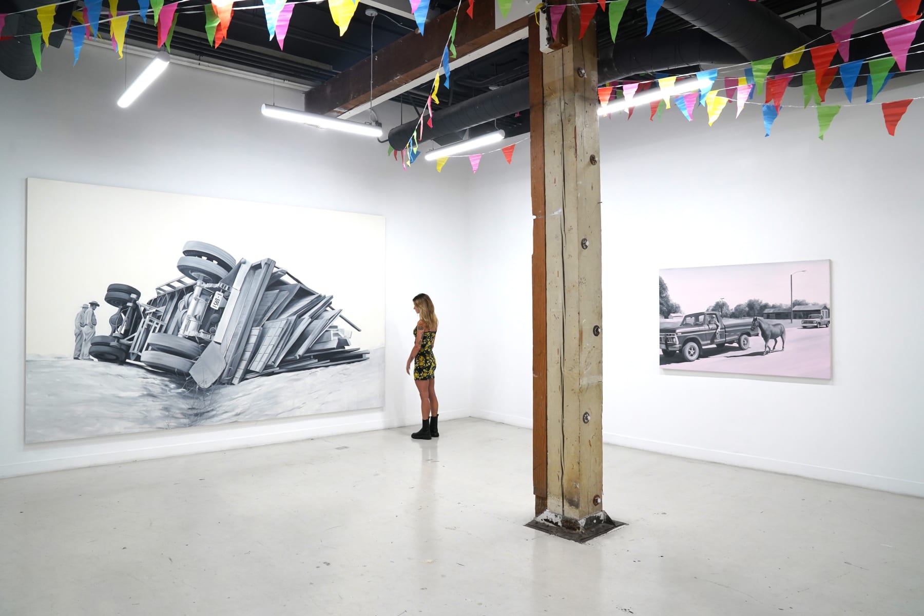 black and white painting of a truck toppled over on a road