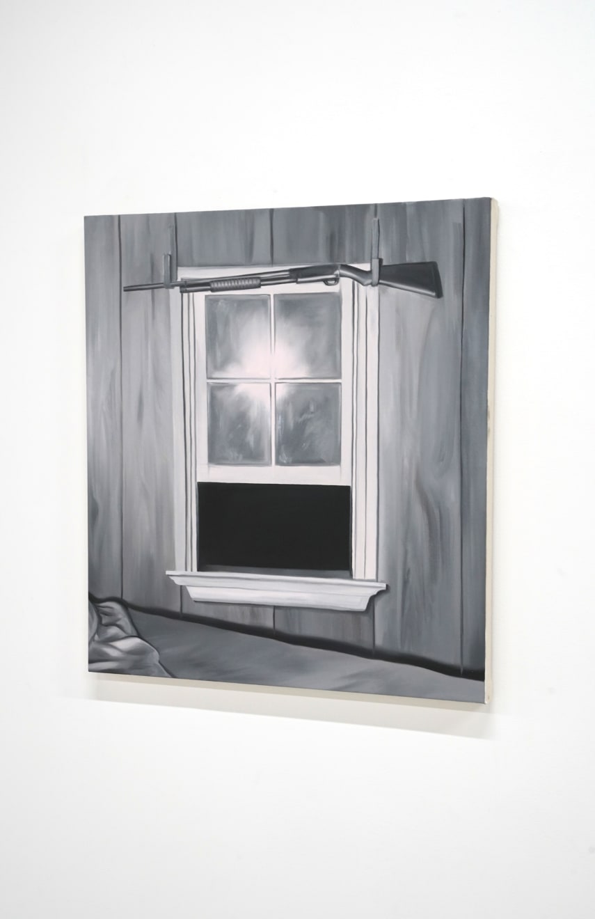 black and white painting of a gun hung above a window