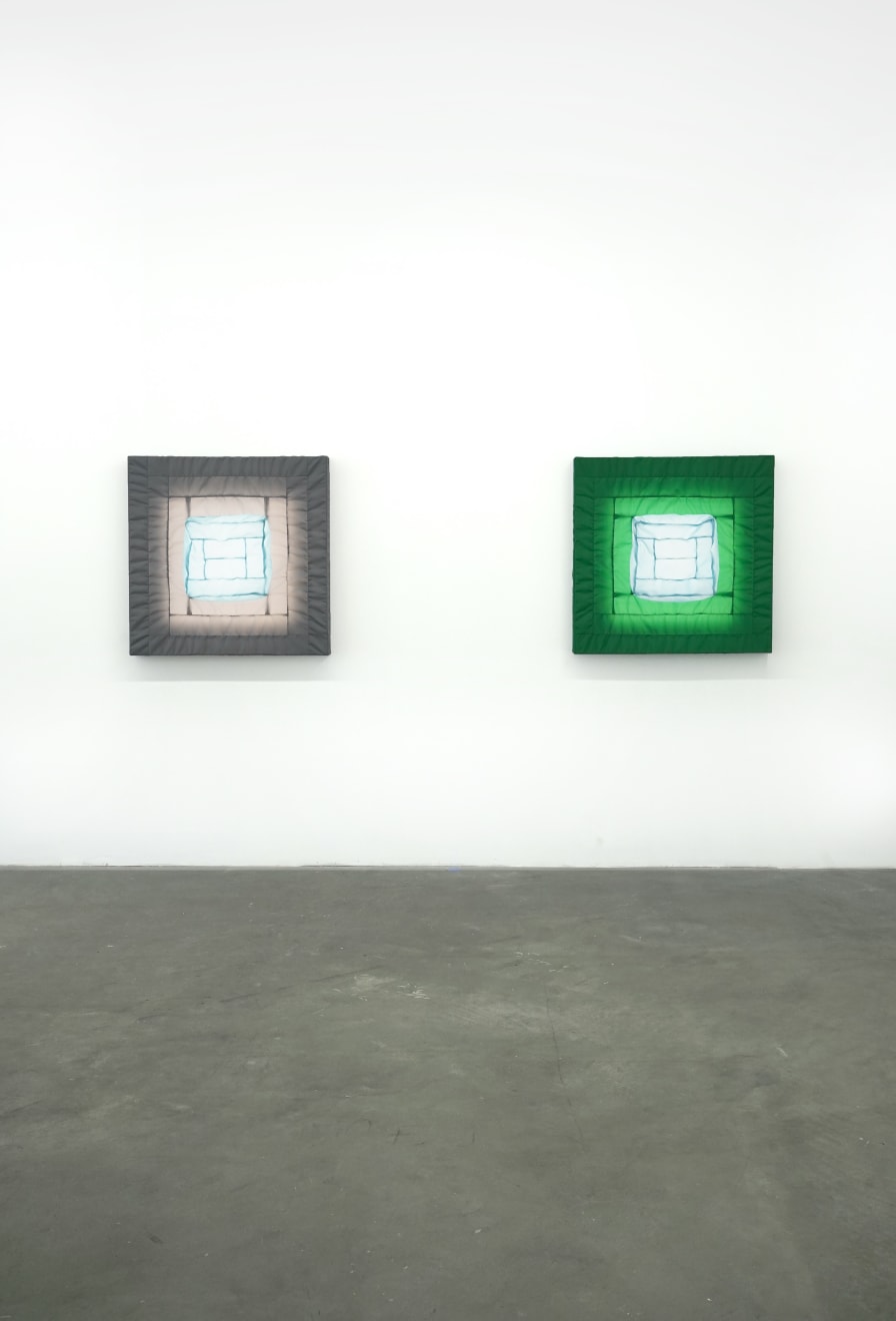 green fabric light hung on wall