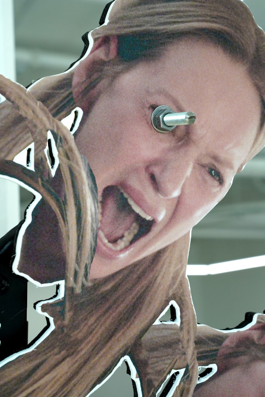 abstract sculpture including multiple portraits of Uma Therman