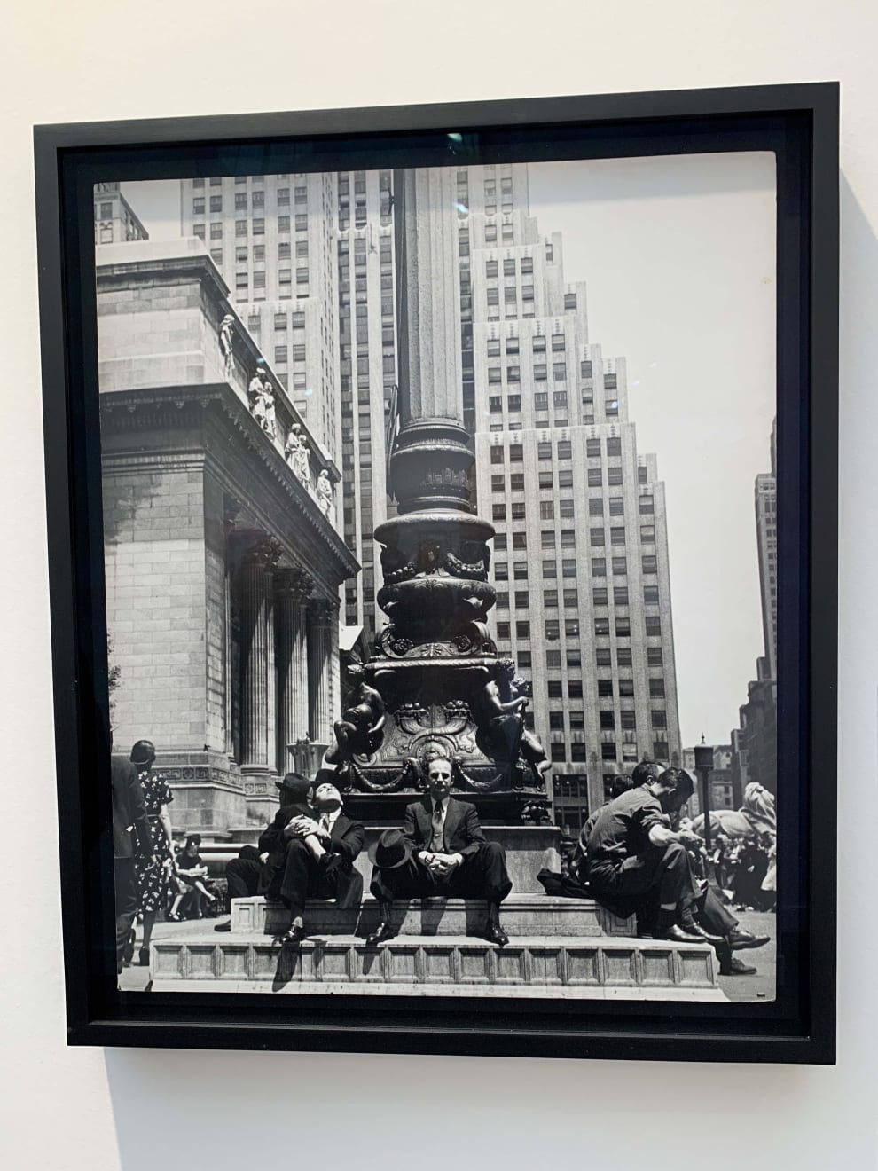 Andre Kertesz, New York (men sitting at base of flag pole), 1938, 1938