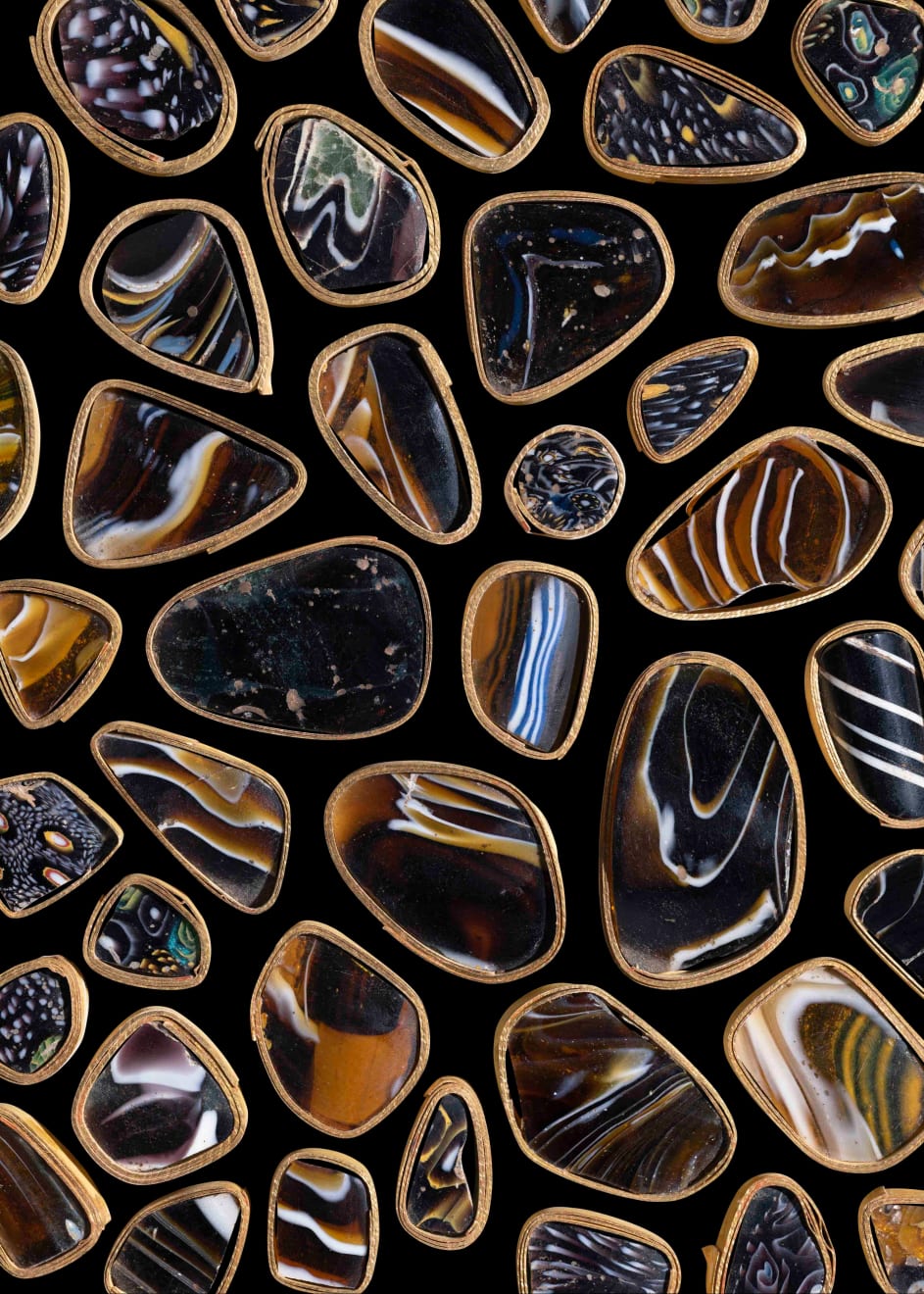 Jaron James, A photographic print of Roman mosaic glass fragments, amber, 2022
