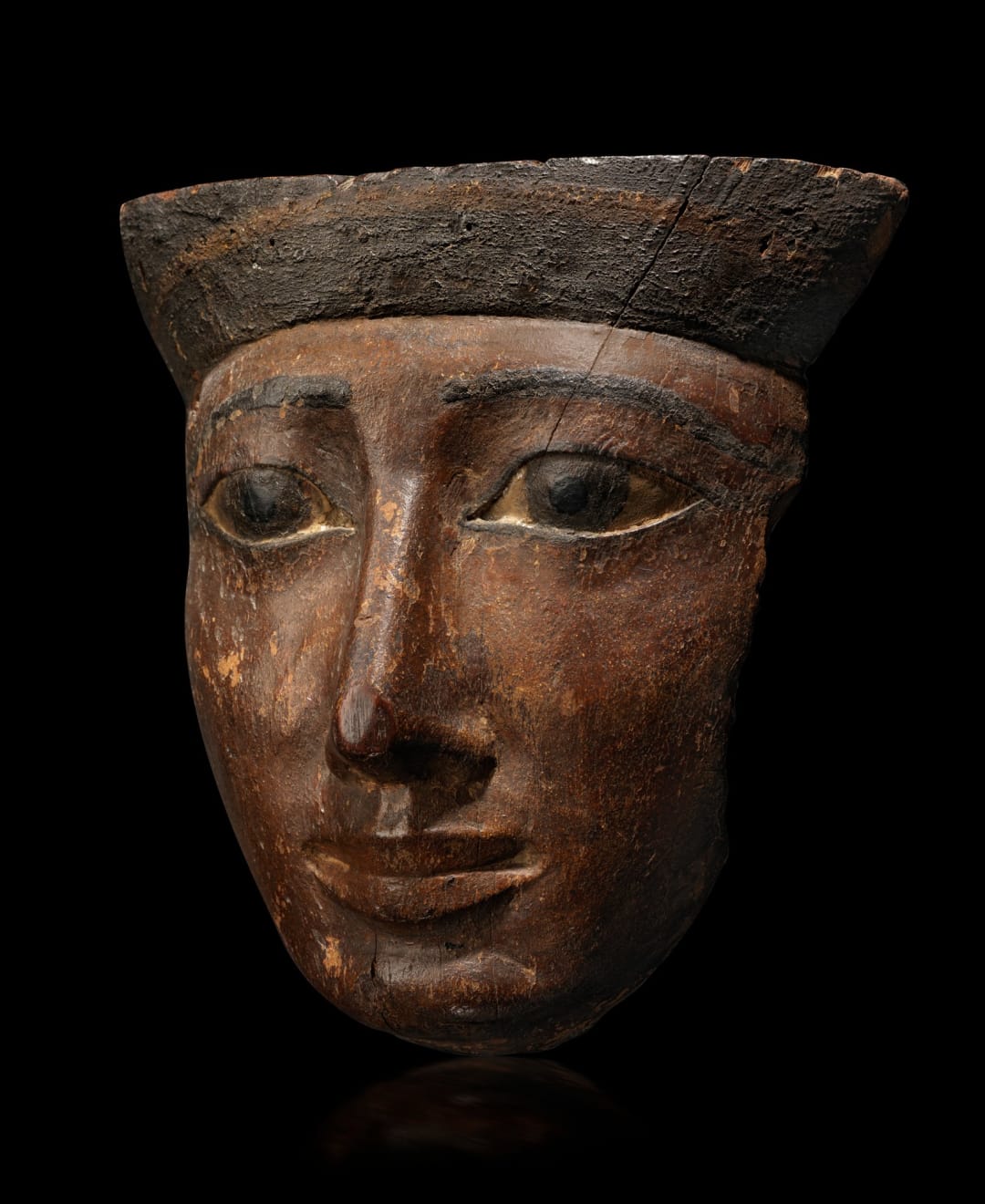 Egyptian, An Egyptian wood mask, Third Intermediate to Late Period, circa 1000 - 600 BC
