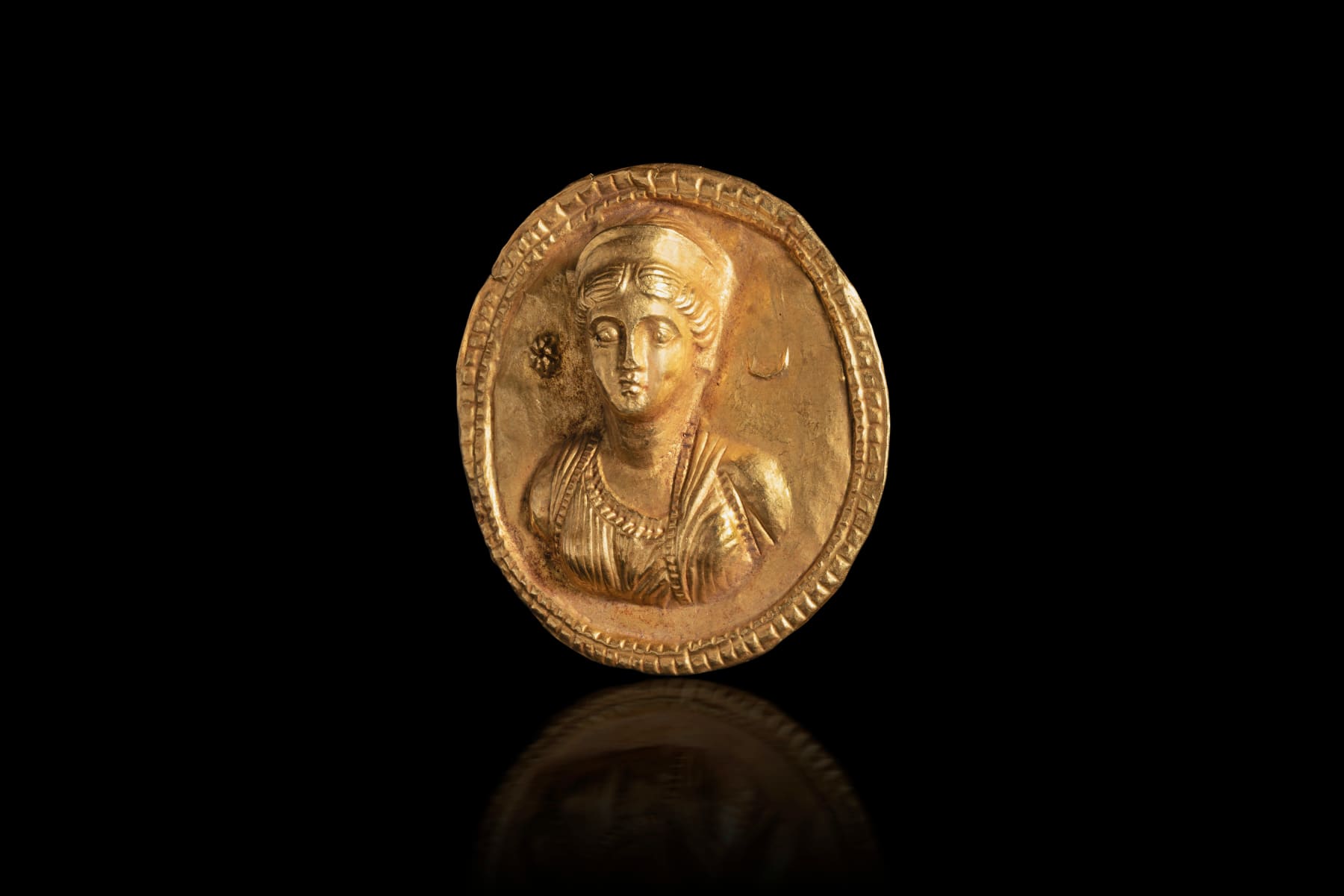 Greek, A Greek gold medallion of Aphrodite, Hellenistic, circa 2nd - 1st century BC