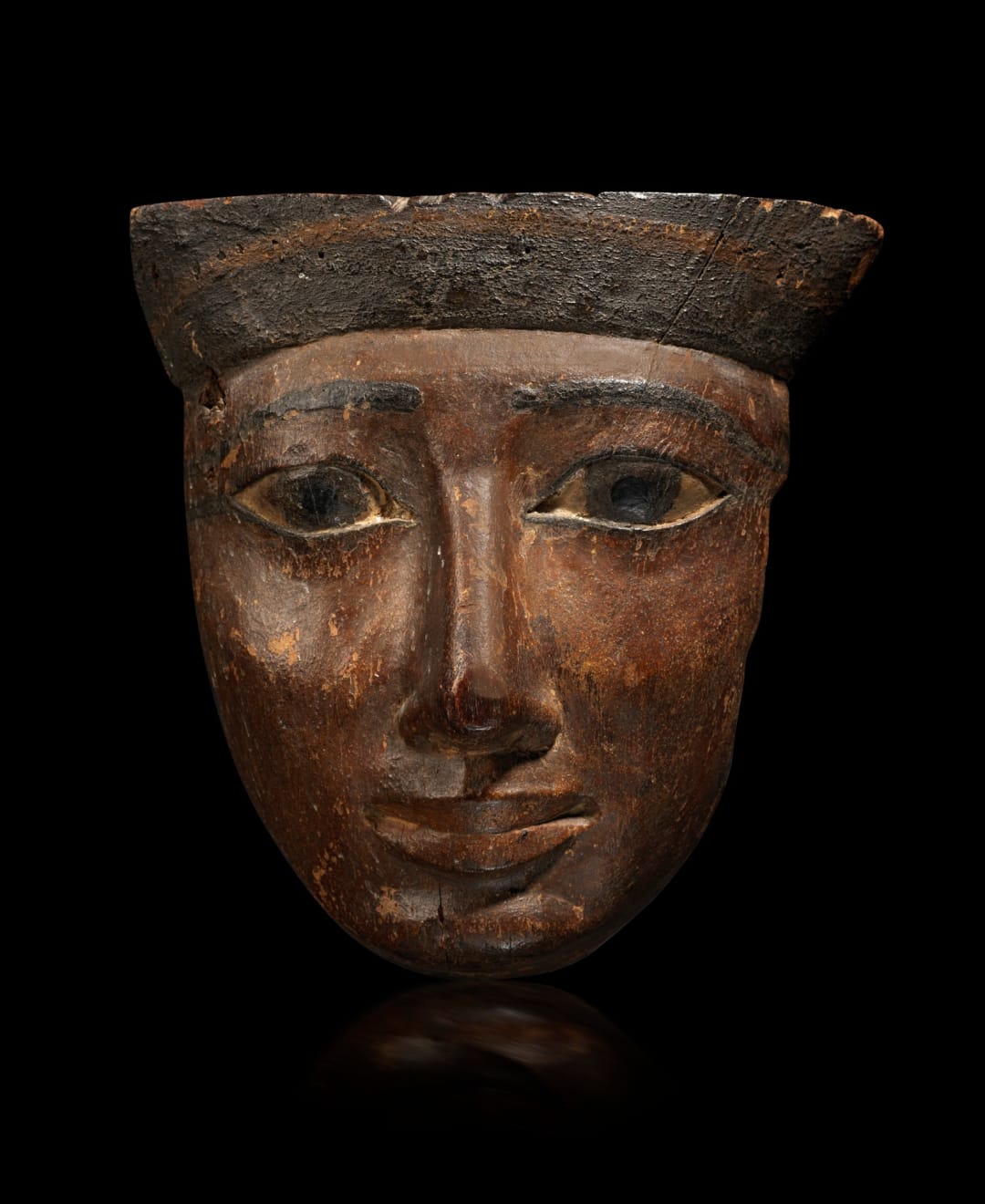 Egyptian, An Egyptian wood mask, Third Intermediate to Late Period, circa 1000 - 600 BC