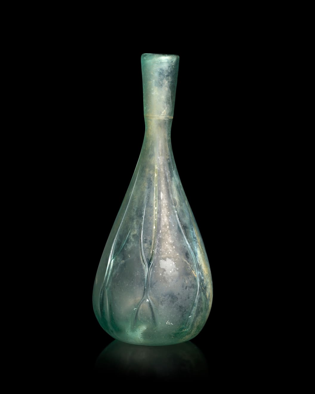 Roman, A Roman pale green glass flask, Circa 3rd - 4th century AD