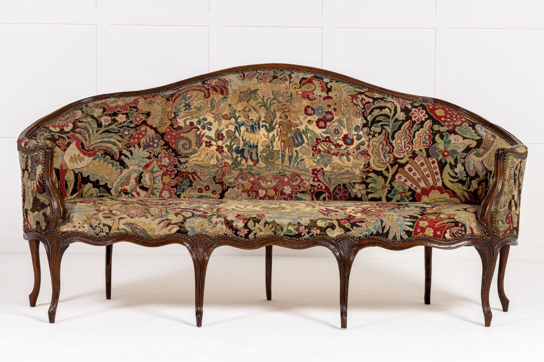 18th Century French Walnut Settee with Needlepoint Upholstery