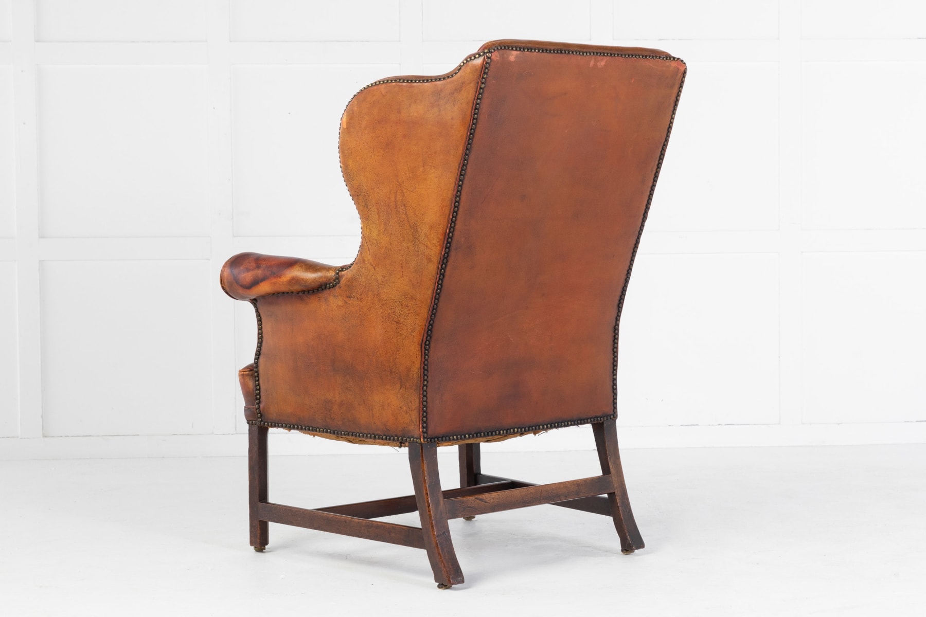 SOLD, George III Mahogany and Leather Wing Chair