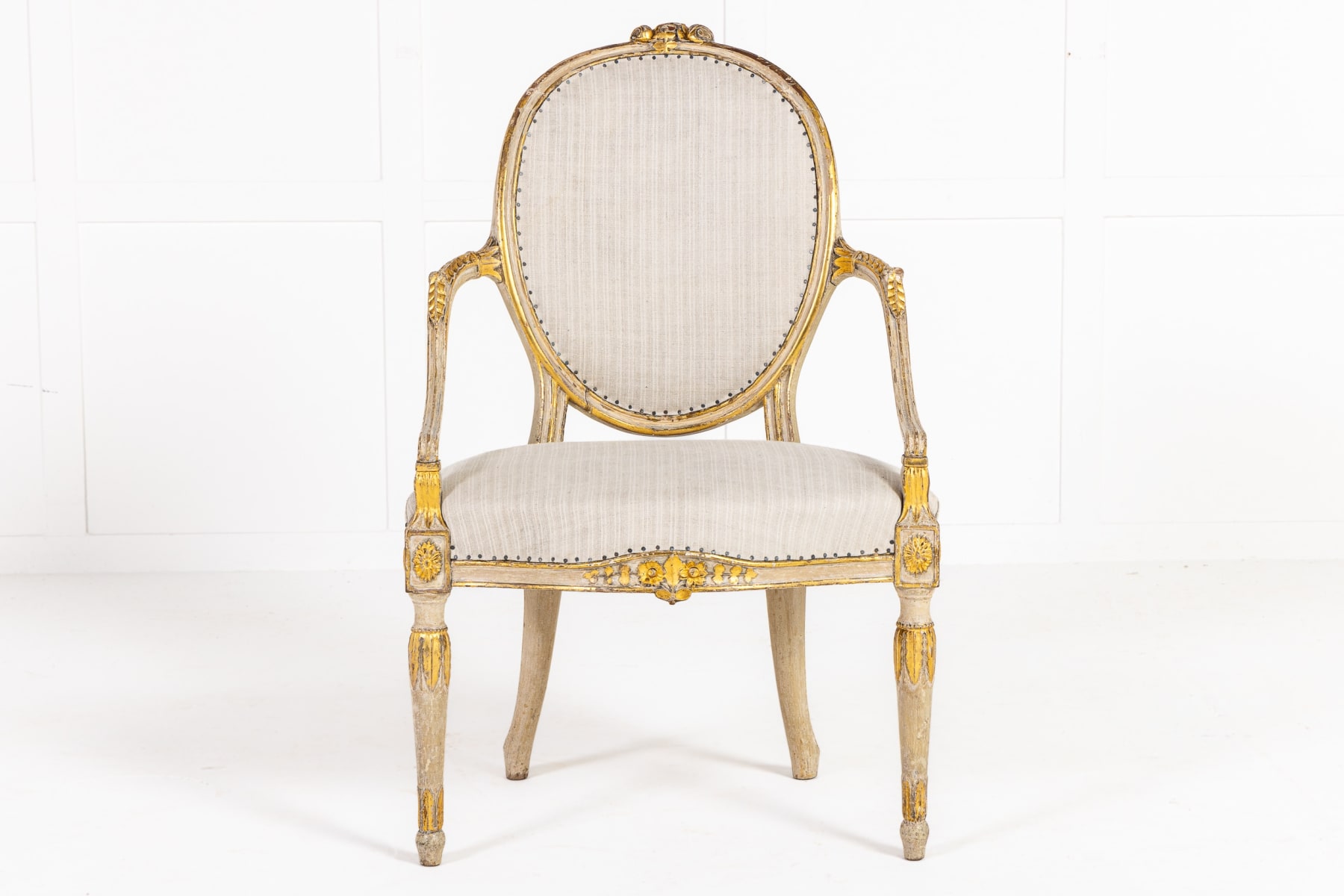 A Rare Late 18th Century English Painted and Parcel Gilt Armchair