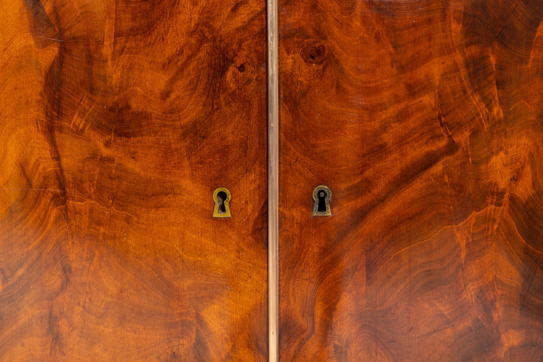 Pair of Early 19th Century Mahogany Demi Lune Cabinets