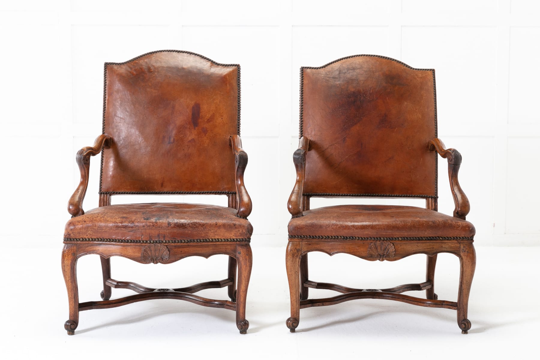 Pair of 18th Century French Walnut and Leather Armchairs